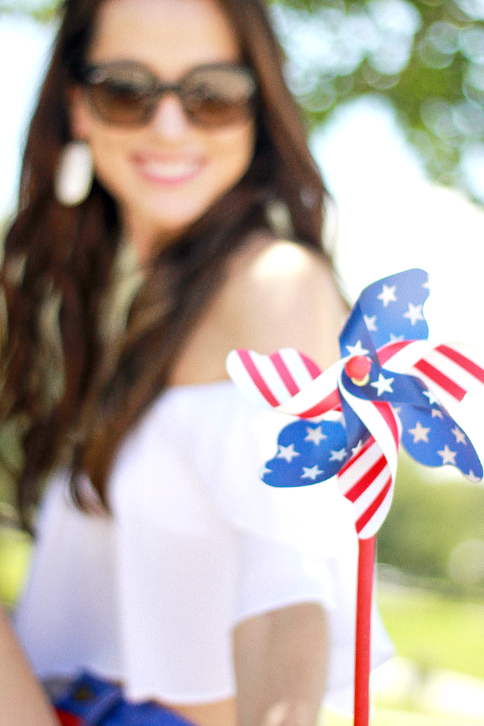 How to wear American flag shorts by southern fashion blogger Stephanie Ziajka from Diary of a Debutante, casual 4th of July outfit idea, acrylic Florida state necklace