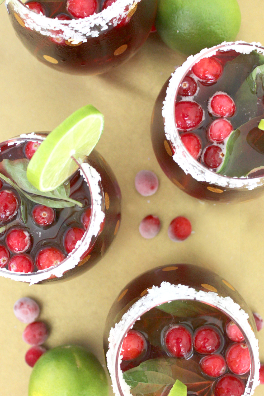 Festive cranberry basil margarita recipe made with Hornitos Tequila by southern blogger Stephanie Ziajka from Diary of a Debutante