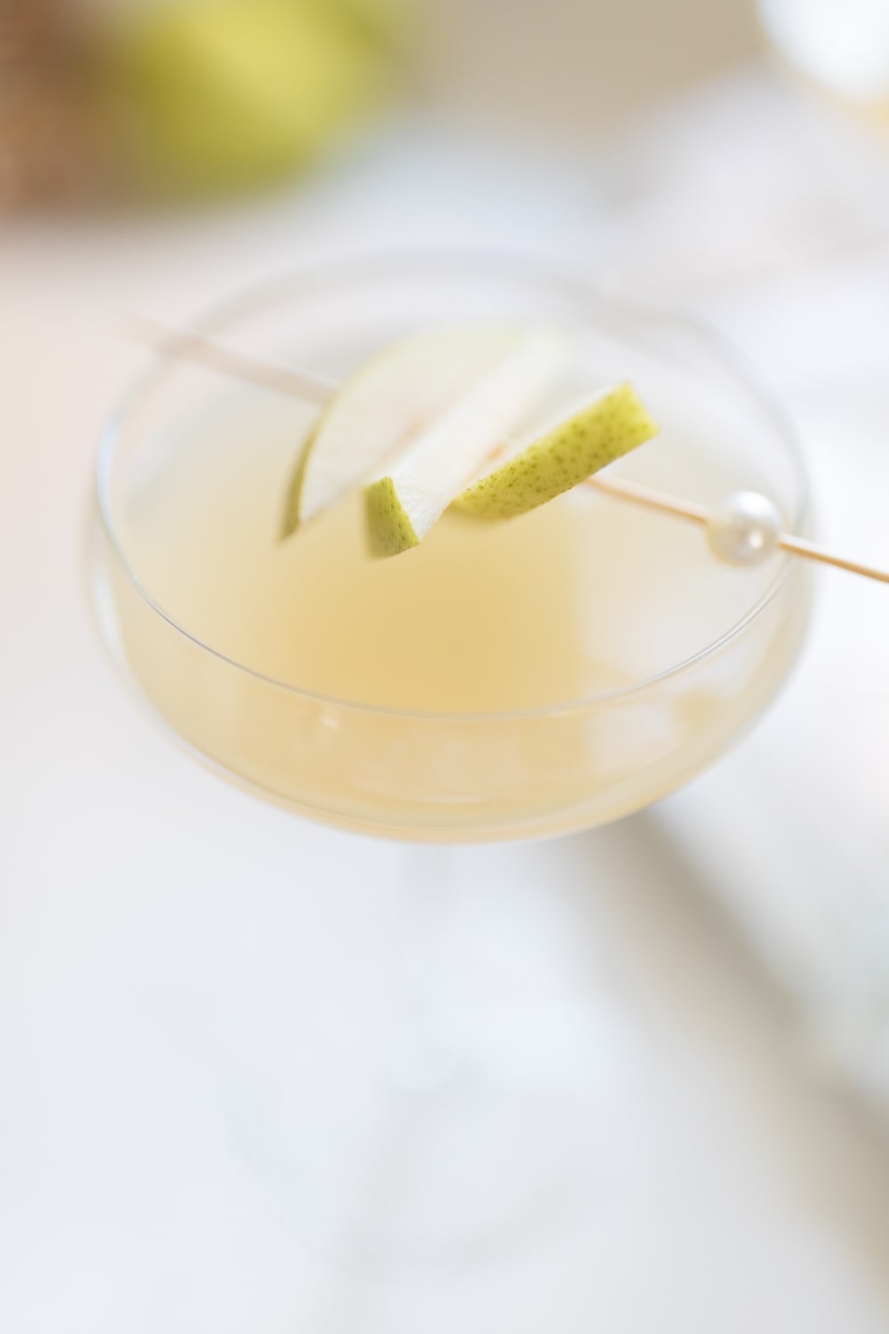 Blogger Stephanie Ziajka shares why this pear mimosa is one of her favorite New Years and Christmas brunch cocktails on Diary of a Debutante