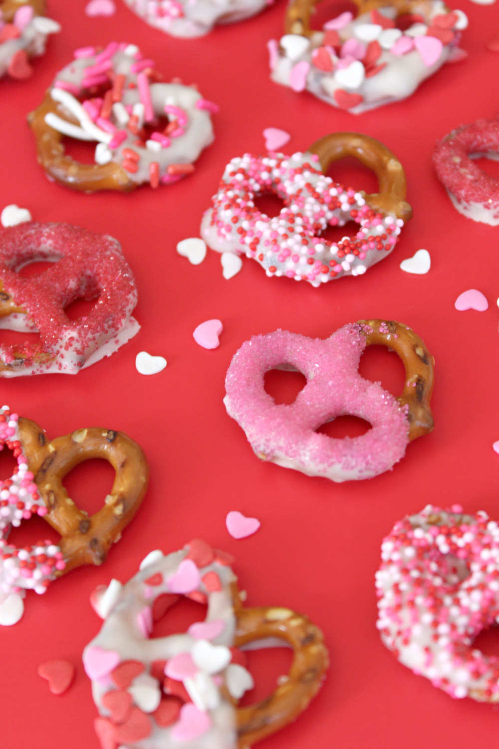 Blogger Stephanie Ziajka shares how to make white chocolate dipped pretzels for Valentines on Diary of a Debutante