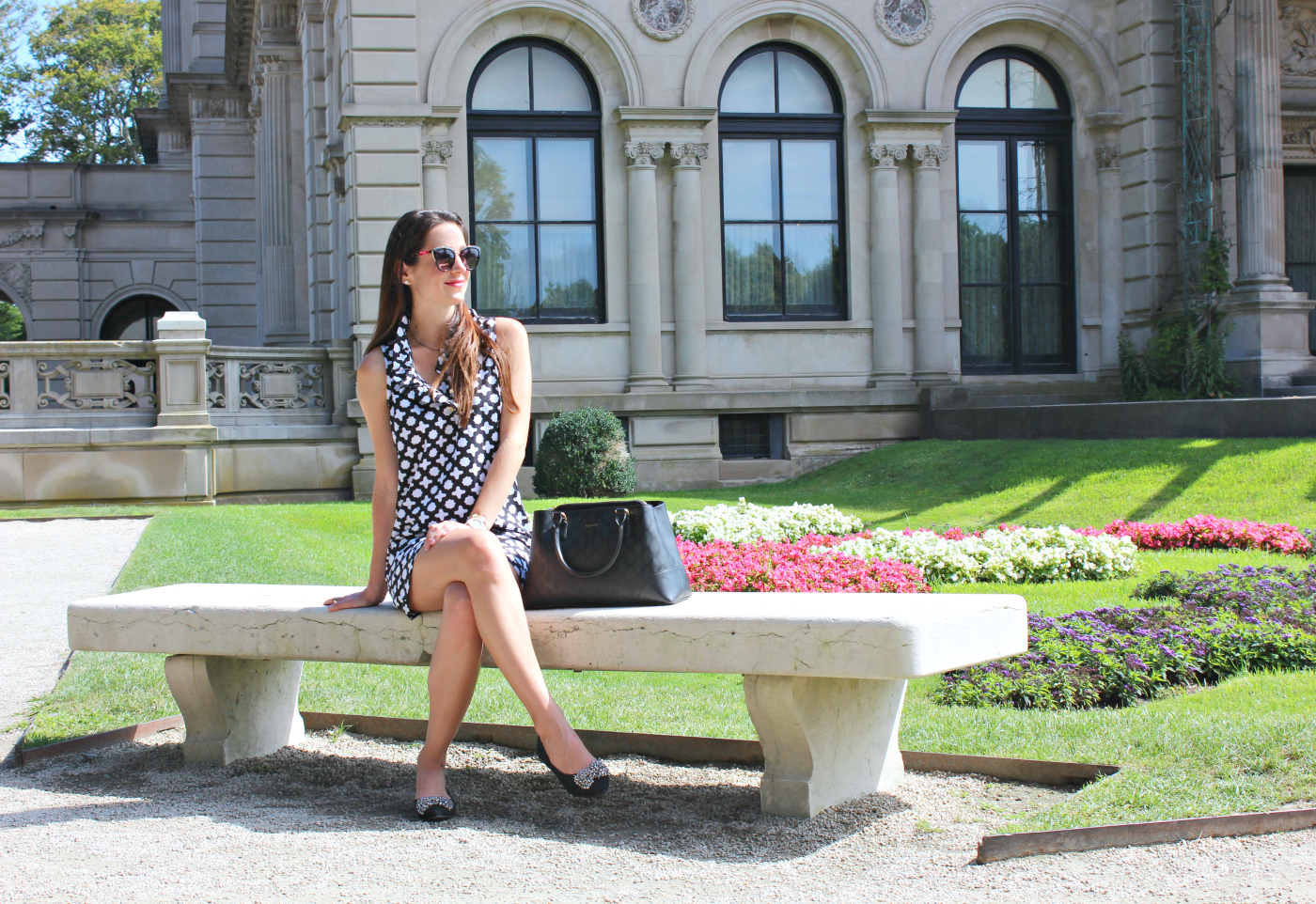 Brit Rose black and white ruffle dress for touring The Breakers in Newport, Rhode Island