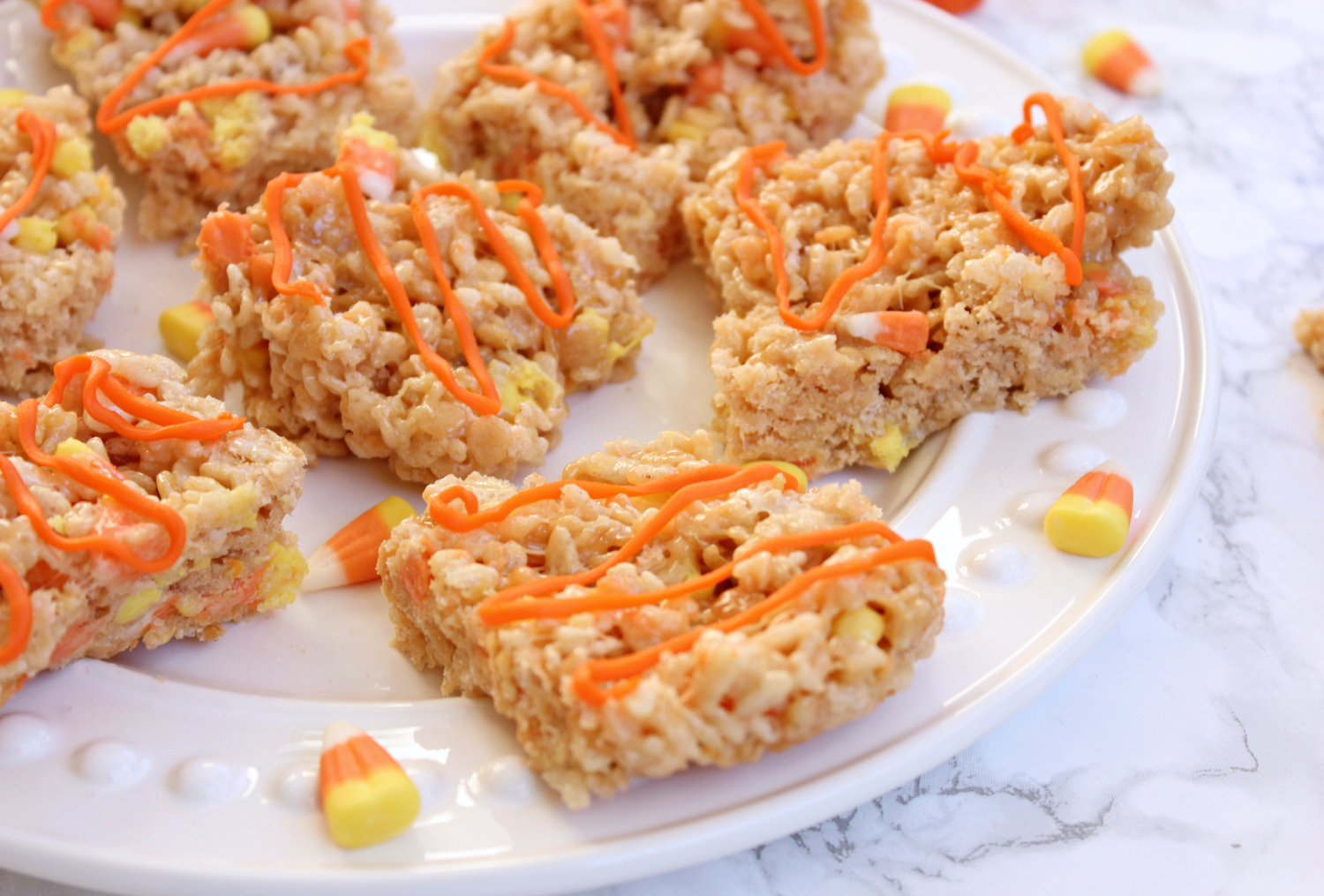 Candy corn rice krispies make a fun, simple, and delicious Halloween snack