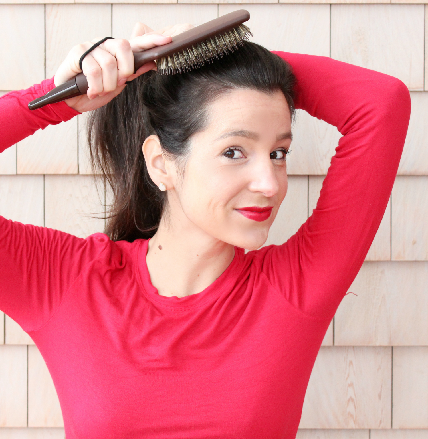 Easy sleek high sock bun tutorial with a 1907 by Fromm Glosser Paddle Brush
