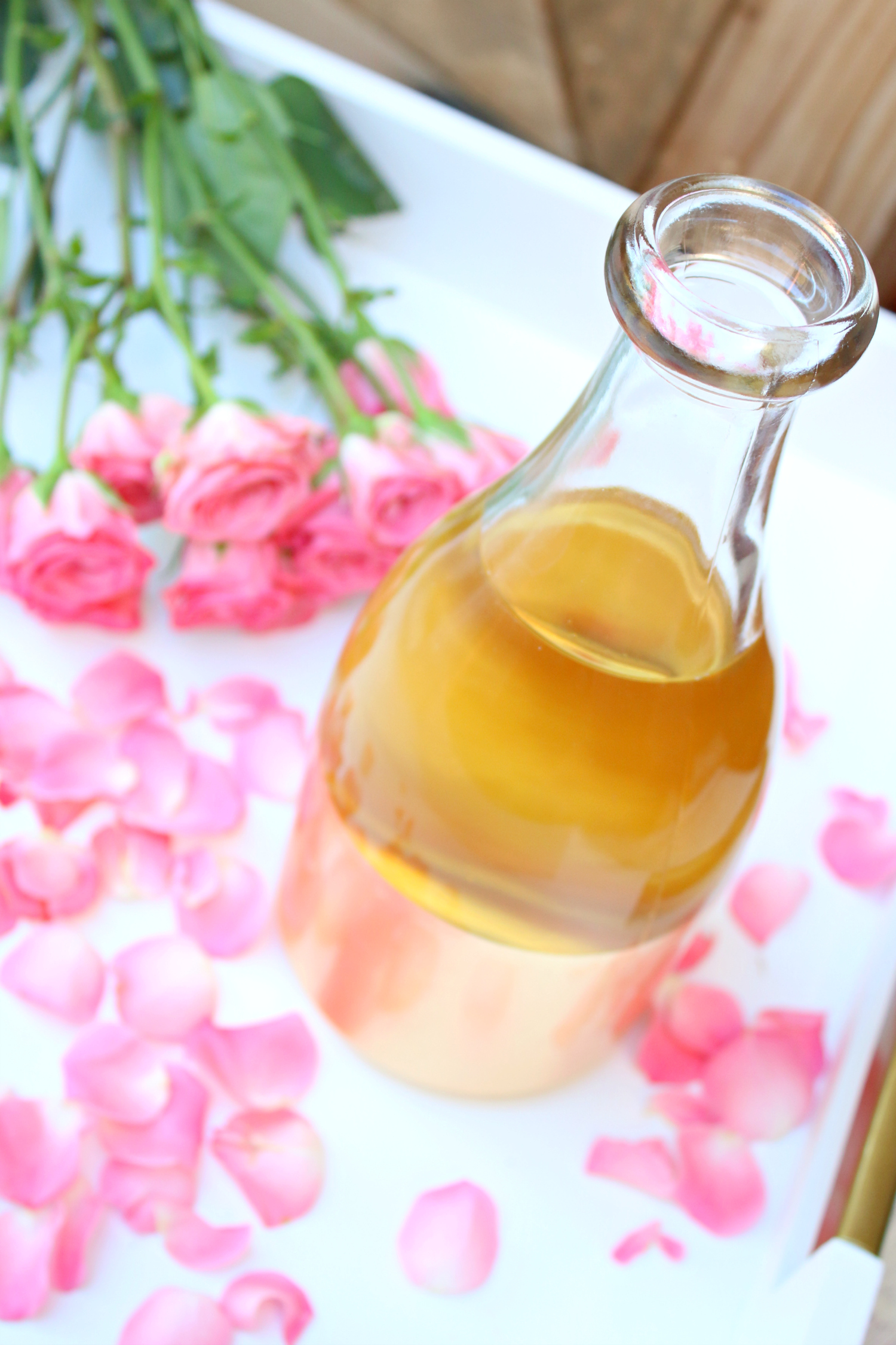 Homemade rose water in a carafe on Diary of a Debutante