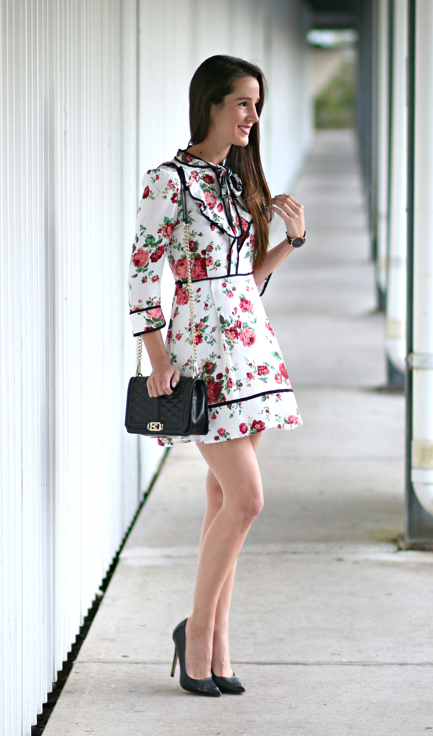 Belle inspired cocktail dress with floral rose print, chic neck tie detailing, and three quarter sleeves