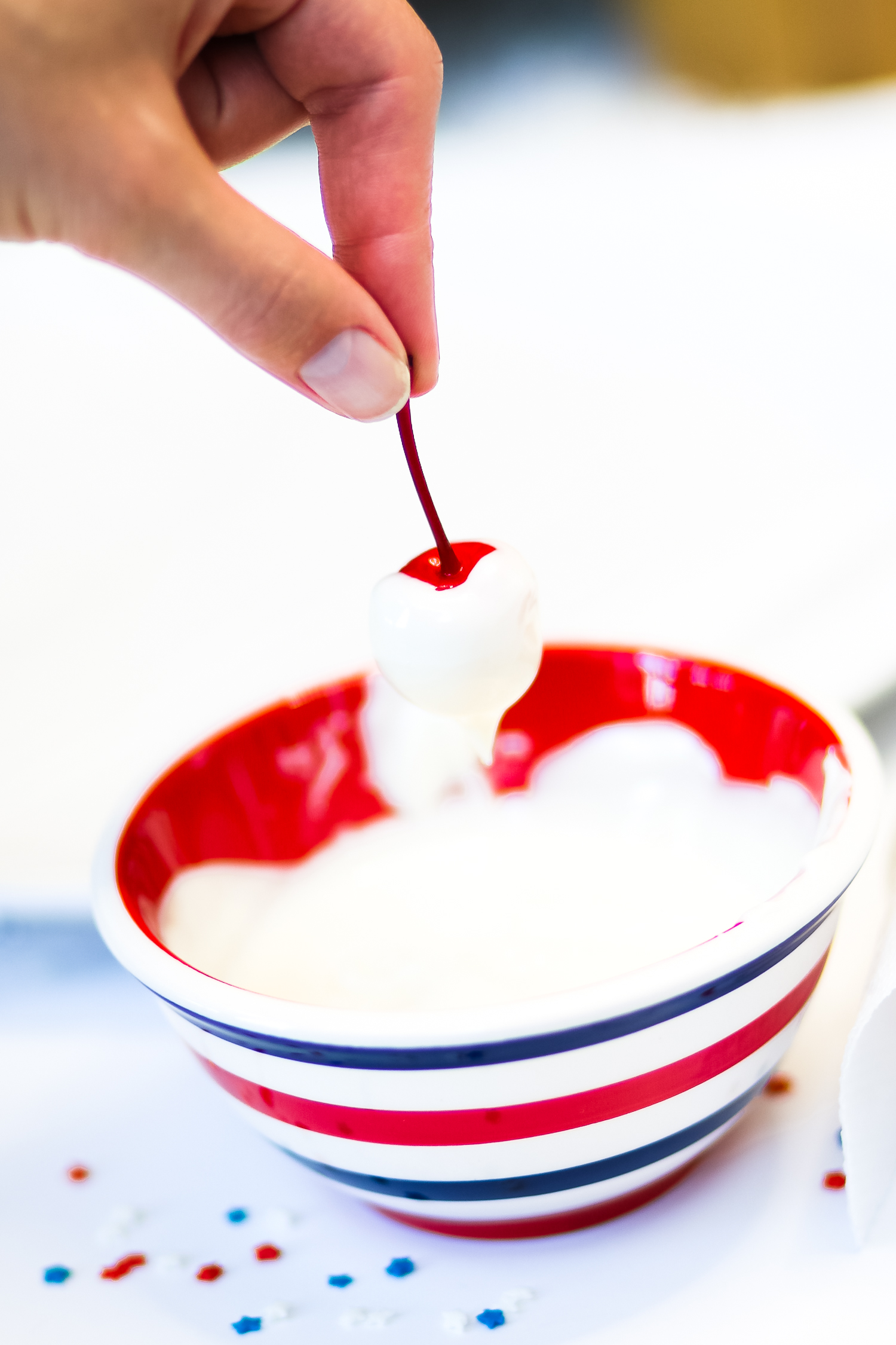 Blogger Stephanie Ziajka shows how to make vodka soaked cherries for the 4th of July on Diary of a Debutante