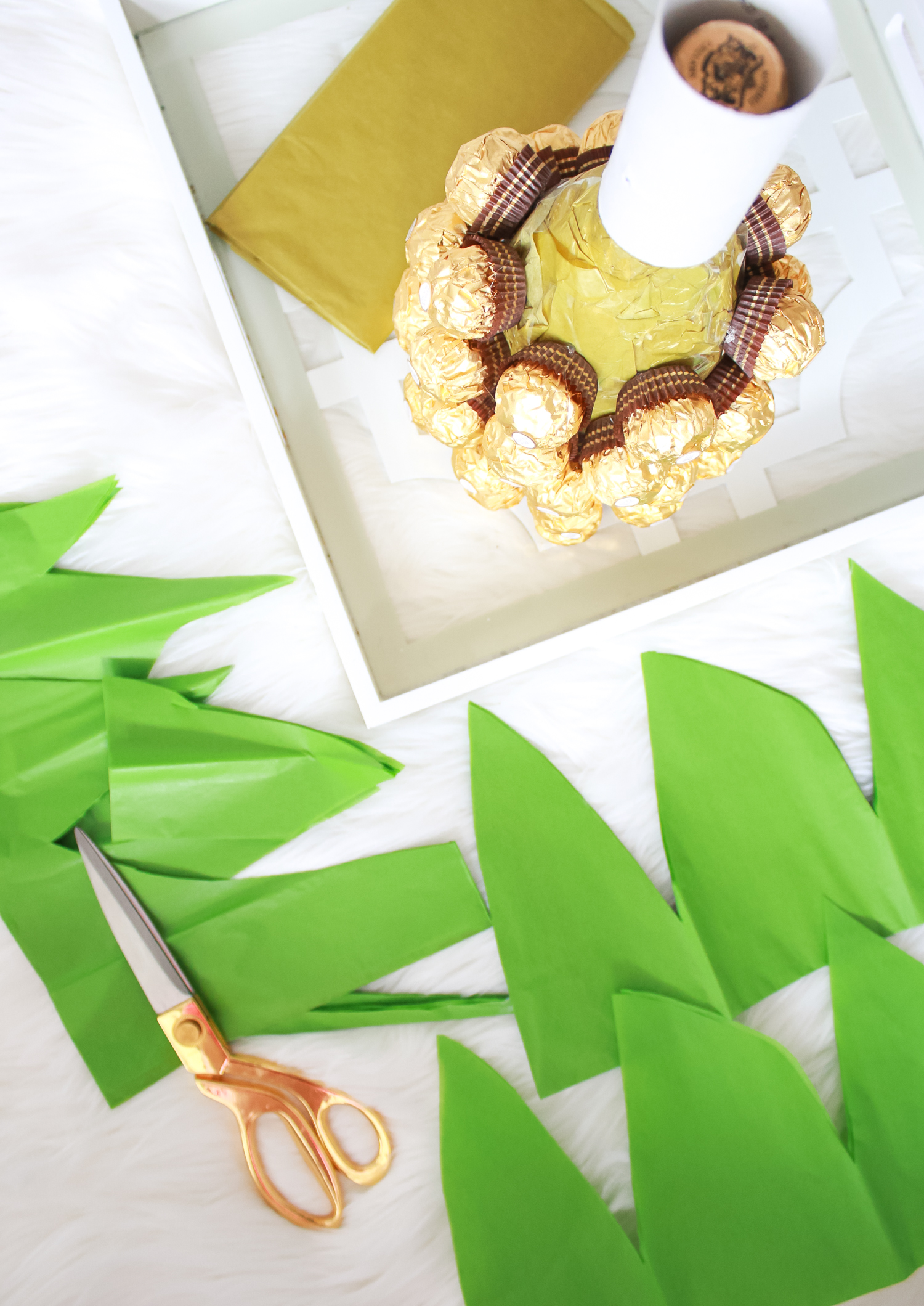 Looking for DIY housewarming gifts? Look no further than this adorable chocolate-covered champagne pineapple by southern blogger Stephanie Ziajka from Diary of a Debutante