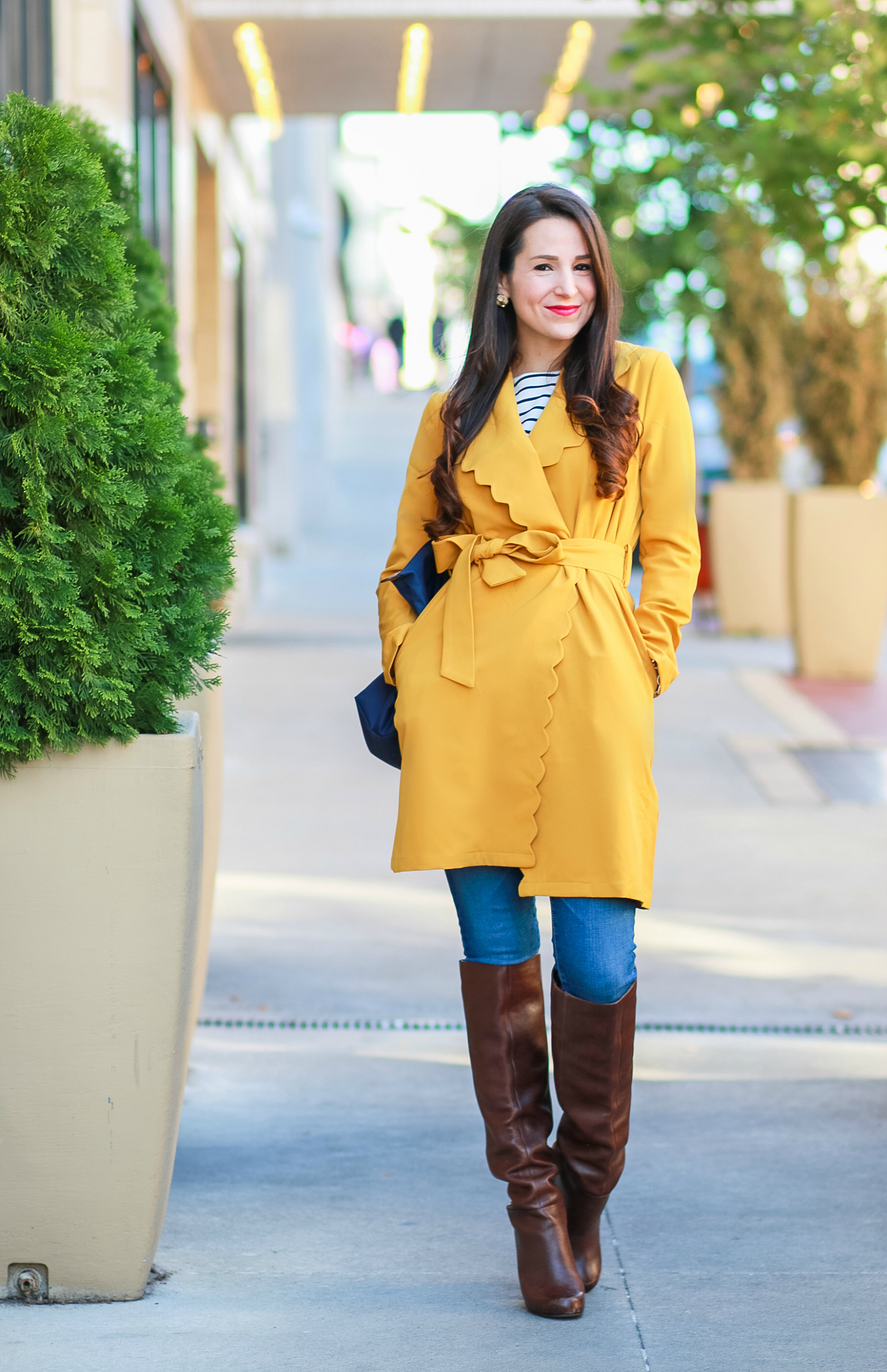 Marigold scalloped coat with AG skinny jeans, English Factory striped top, Nine West brown tall boots, and large navy Longchamp tote | Color Crush: Marigold Scalloped Coat by fashion blogger Stephanie Ziajka from Diary of a Debutante