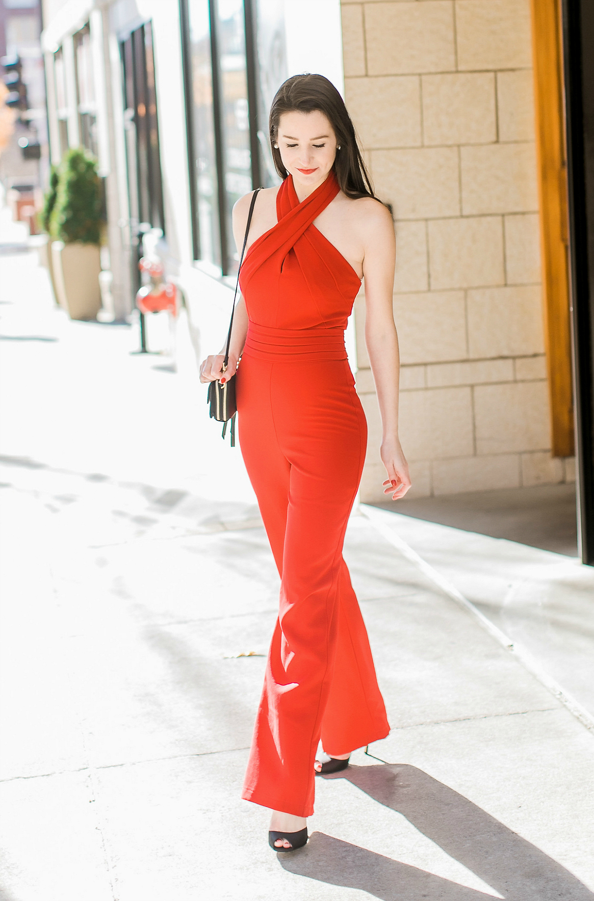 Blogger Stephanie Ziajka shows how to wear a jumpsuit to a holiday work party on Diary of a Debutante