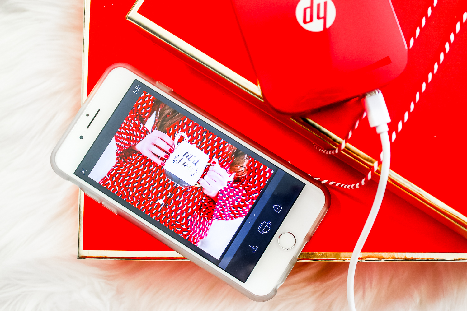 Red HP Sprocket Photo Printer, which makes a perfect stocking stuffer and is the best instant photo printer for events and travel by southern blogger Stephanie Ziajka from Diary of a Debutante