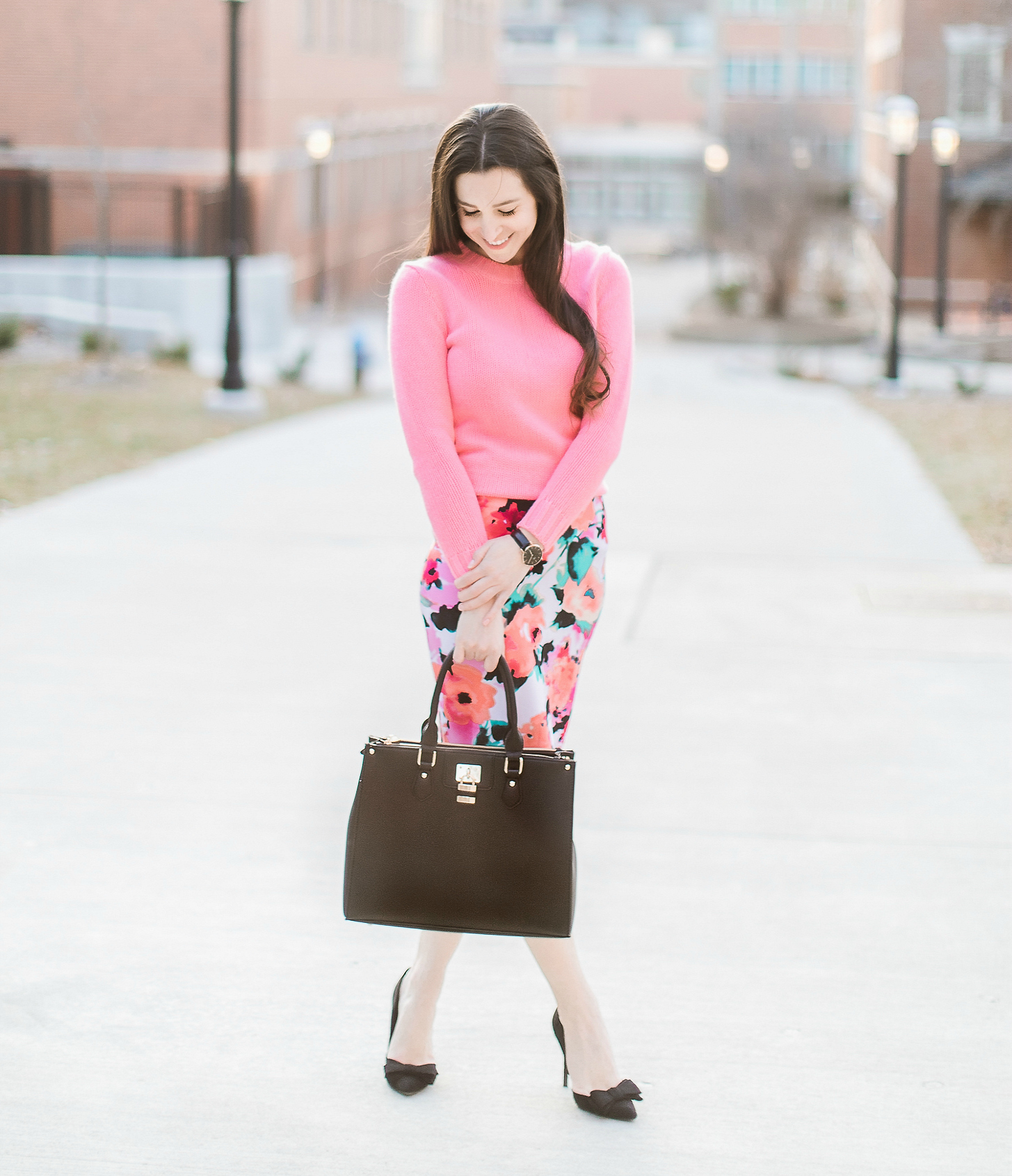 watercolor floral pencil skirt from The Mint Julep Boutique with pink J.Crew Factory crewneck sweater, black bow pumps, Dasein black satchel handbag, and black Daniel Wellington Classic Petite Sheffield watch, how to wear a long pencil skirt, Watercolor Blooms: How to Wear a Floral Pencil Skirt by fashion blogger Stephanie Ziajka from Diary of a Debutante, Catherine Rhodes Photography