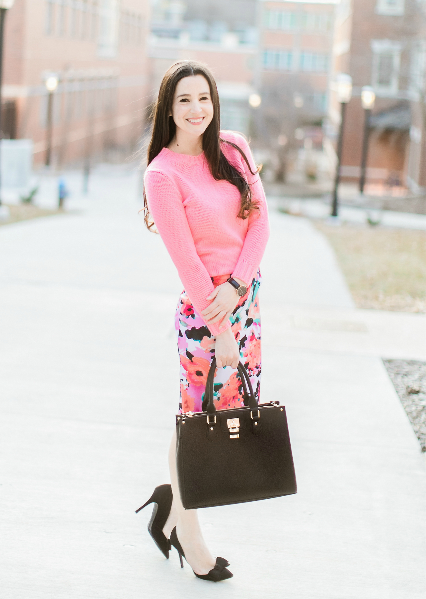 watercolor floral pencil skirt from The Mint Julep Boutique with pink J.Crew Factory crewneck sweater, black bow pumps, Dasein black satchel handbag, and black Daniel Wellington Classic Petite Sheffield watch, how to wear a long pencil skirt, Watercolor Blooms: How to Wear a Floral Pencil Skirt by fashion blogger Stephanie Ziajka from Diary of a Debutante, Catherine Rhodes Photography