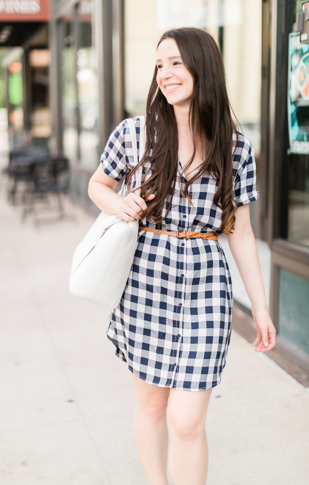 How to wear a plaid shirtdress in the summer by southern fashion blogger Stephanie Ziajka from Diary of a Debutante, how to wear plaid shirtdress, plaid shirt dress outfit, style plaid, BB Dakota Cicely Shirtdress styled with white Jack Rogers sandals, a white Vera Bradley Mallory tote, skinny braided leather belt, and large pearl stud earrings