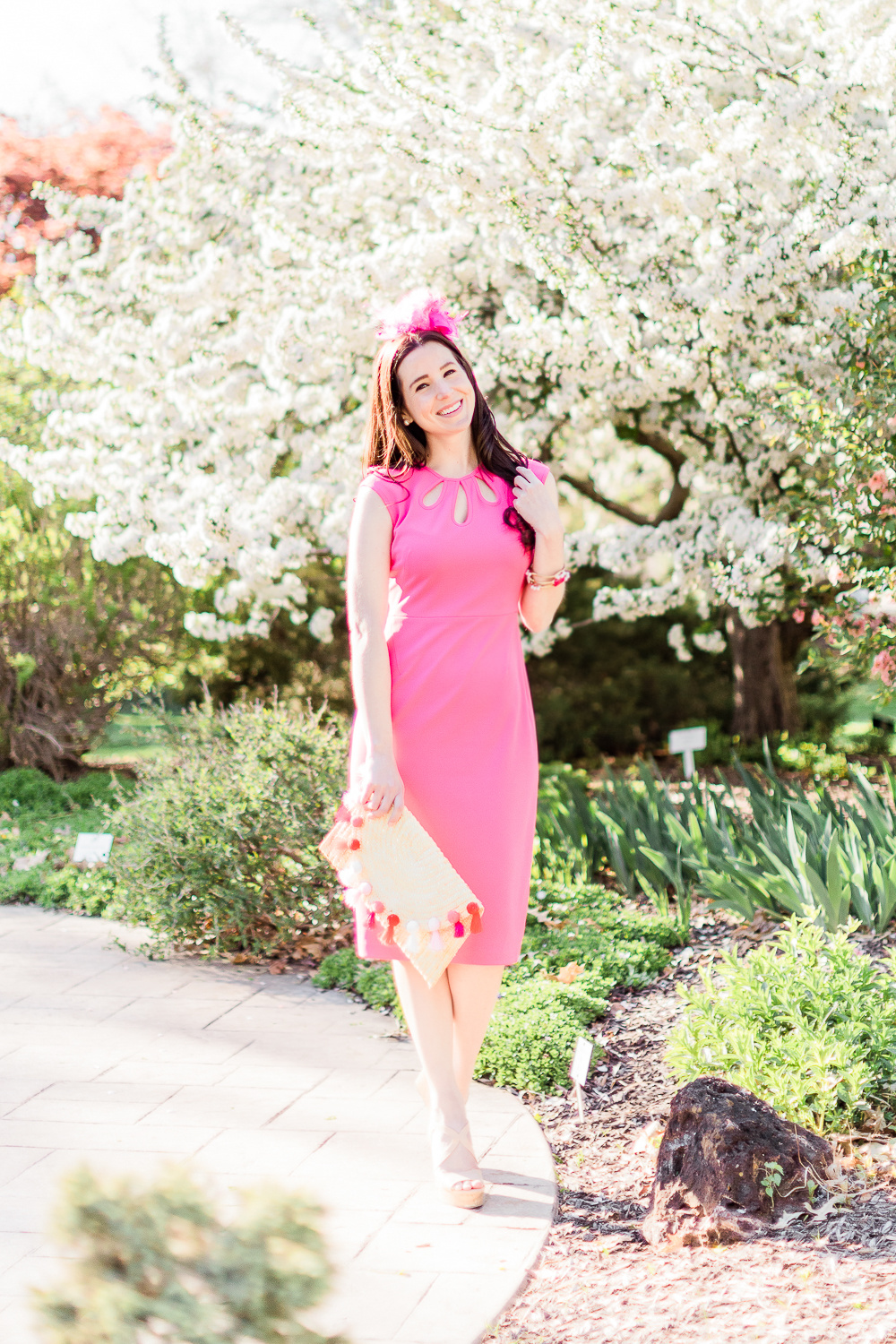 Maggy London Alyssa Midi Dress styled with a pink fascinator headband, straw pom pom and tassel clutch, and nude Steve Madden wedges, Derby Day Style Guide: 3 Head-to-Toe Kentucky Derby Outfit Ideas by affordable fashion blogger Stephanie Ziajka from Diary of a Debutante