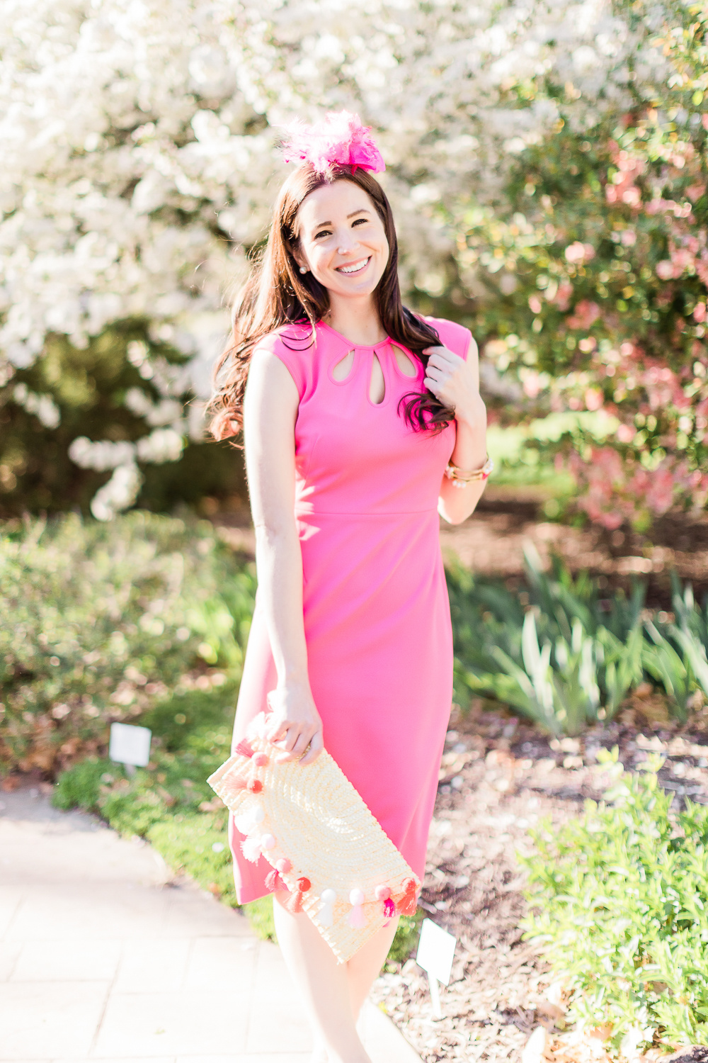 Maggy London Alyssa Midi Dress styled with a pink fascinator headband, straw pom pom and tassel clutch, and nude Steve Madden wedges, Derby Day Style Guide: 3 Head-to-Toe Kentucky Derby Outfit Ideas by affordable fashion blogger Stephanie Ziajka from Diary of a Debutante