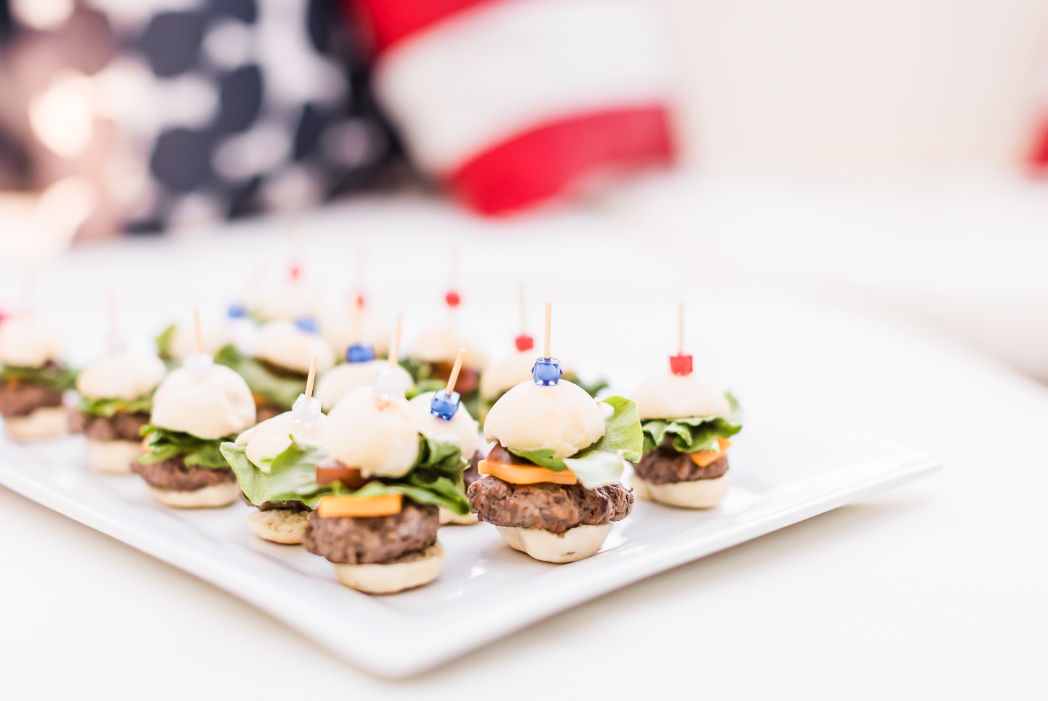 Itty Bitty Mini Cheeseburgers: The Perfect Summer Appetizer by popular Missouri blogger Stephanie Ziajka on Diary of a Debutante, 4th of July mini cheeseburger appetizer, Missouri beef appetizer, simple 4th of July appetizers, red white and blue party picks