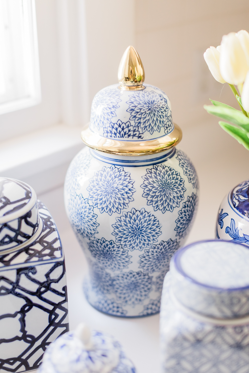 Amazon Home Decor Finds: Blue and White Ginger Jars under $100 by popular southern lifestyle blogger Stephanie Ziajka on Diary of a Debutante, blue and white ceramic vase, blue and white ceramics, blue and white porcelain ginger jars, large ginger jars, small ginger jars, how to decorate with ginger jars, ginger jar vase with white tulips