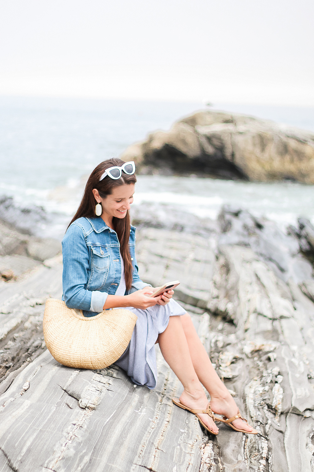 5 Reasons to Upgrade to 5G + Verizon's Best 5G Smartphones by popular midwest lifestyle blogger Stephanie Ziajka from Diary of a Debutante, top Verizon 5G enabled smartphones, Pemaquid Point Maine, Maine coastline, gray short sleeve maxi dress with denim jacket outfit, cute Maine vacation outfit