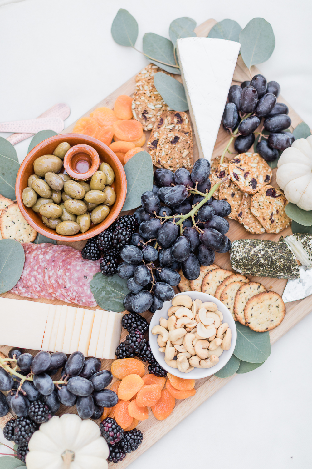 Blogger Stephanie Ziajka shares how to make a charcuterie board for fall on Diary of a Debutante