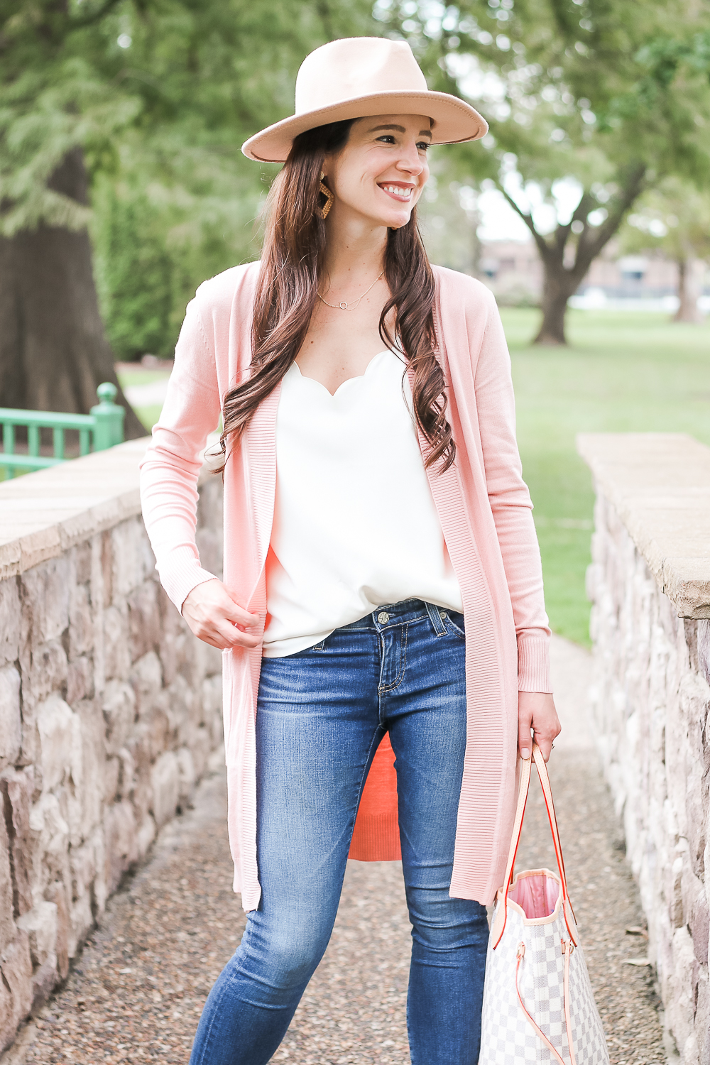 Amazon light pink cardigan styled with J.Crew Factory scalloped cami top, AG the Legging super skinny jeans, and Amazon Lanzom wide brim fedora hat by popular affordable style blogger Stephanie Ziajka on Diary of a Debutante