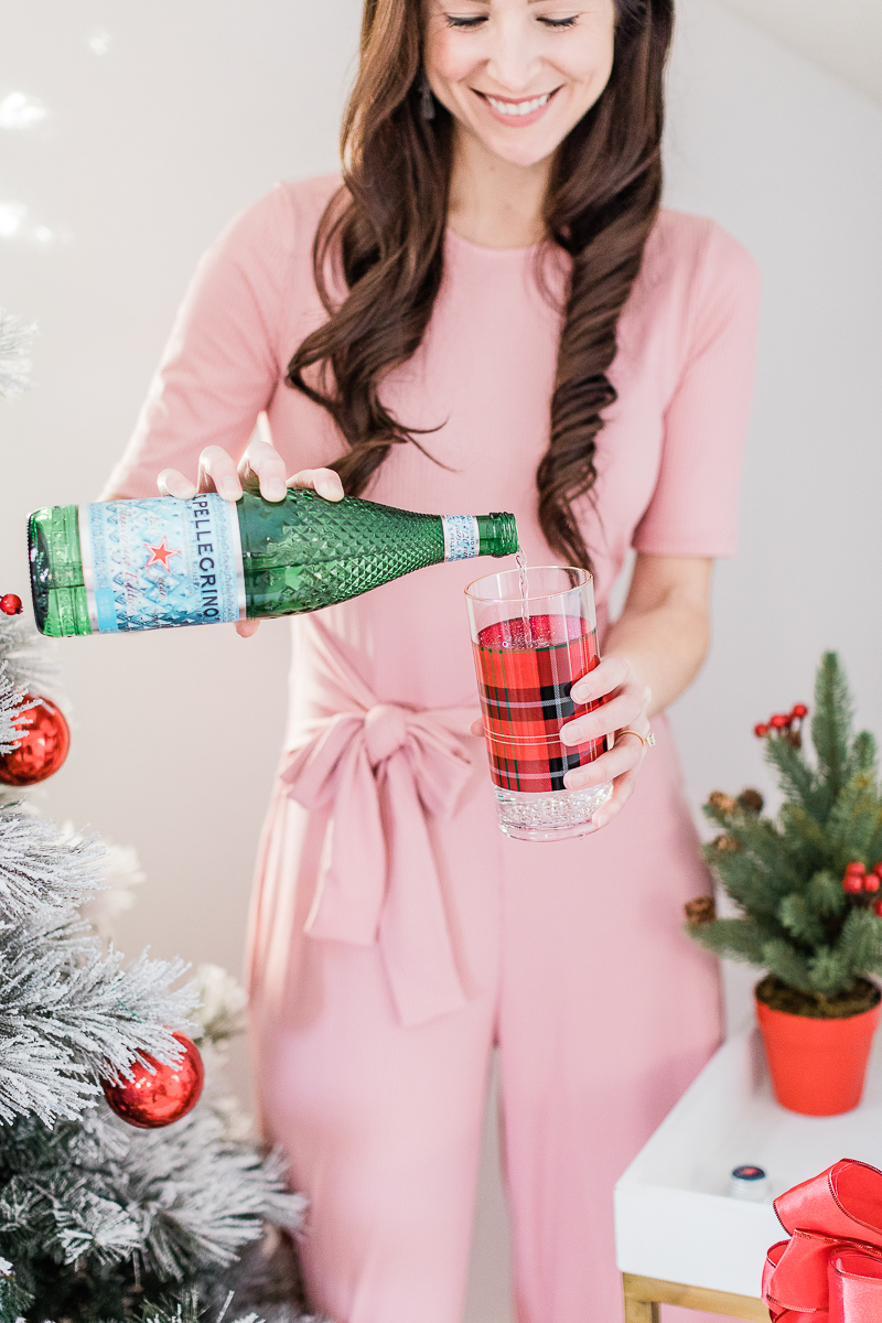 girl pouring drink into glass, special edition diamond pellegrino bottle, limited edition pellegrino, red plaid tumbler, popular lifestyle blogger Stephanie Ziajka, popular lifestyle blog Diary of a Debutante
