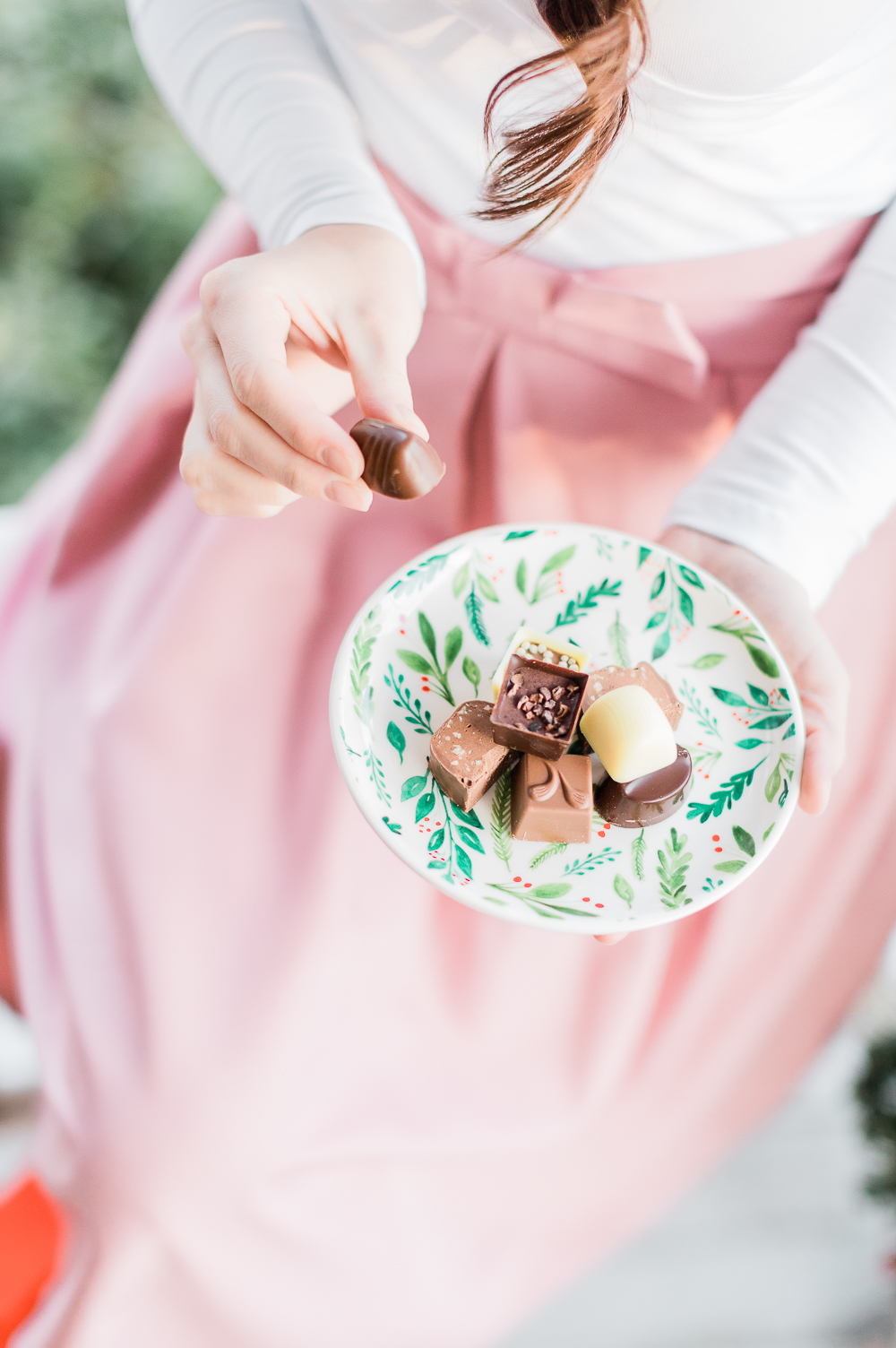 Ferrero Golden Gallery Signature Chocolates, girl eating chocolate, chocolates on a holiday tidbit plate, pink bow skirt, popular lifestyle blog Diary of a Debutante, popular lifestyle blogger Stephanie Ziajka