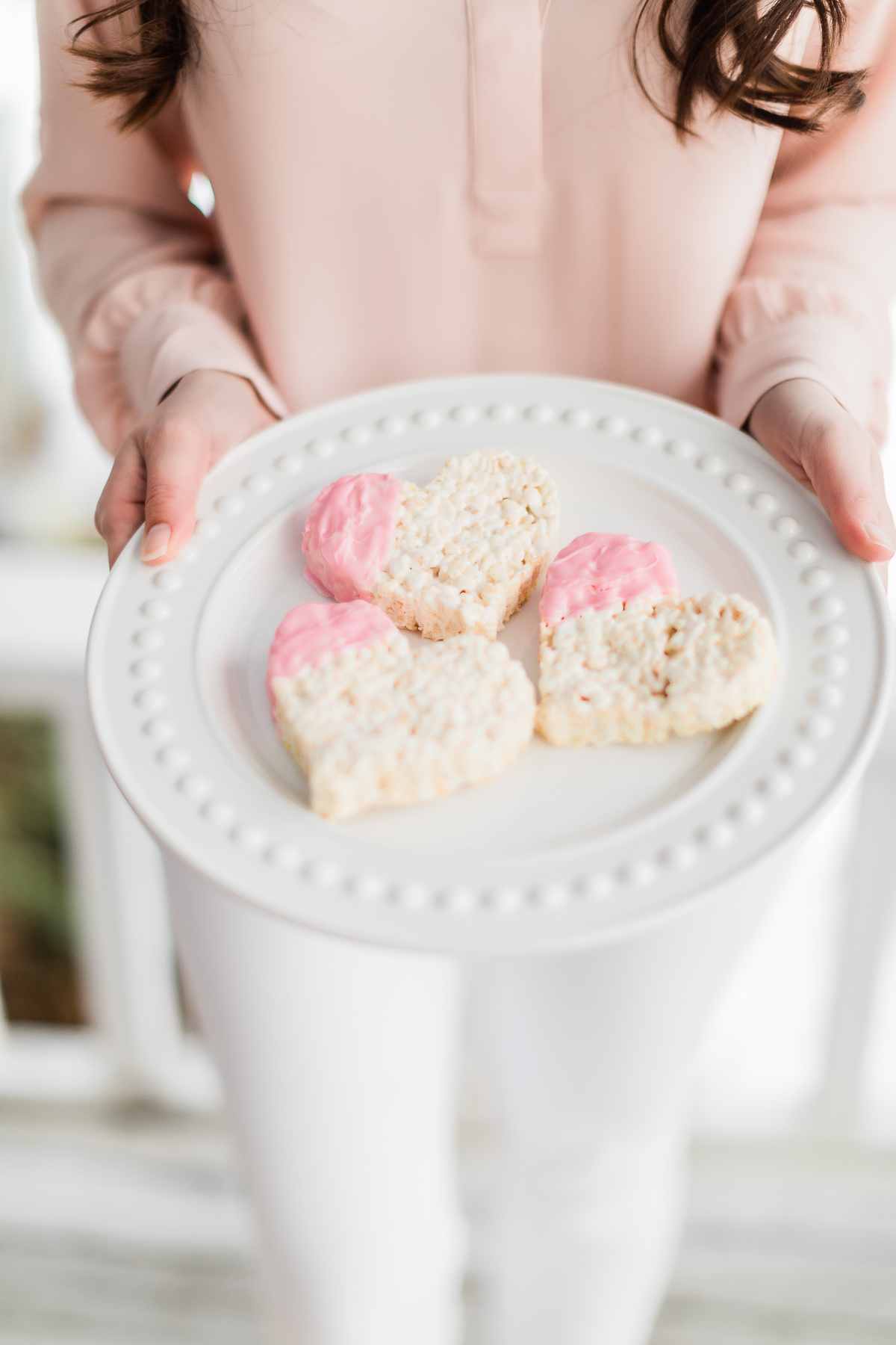Southern lifestyle blogger Stephanie Ziajka of Diary of a Debutante shares an easy chocolate dipped rice krispie treats recipe for Valentine's Day