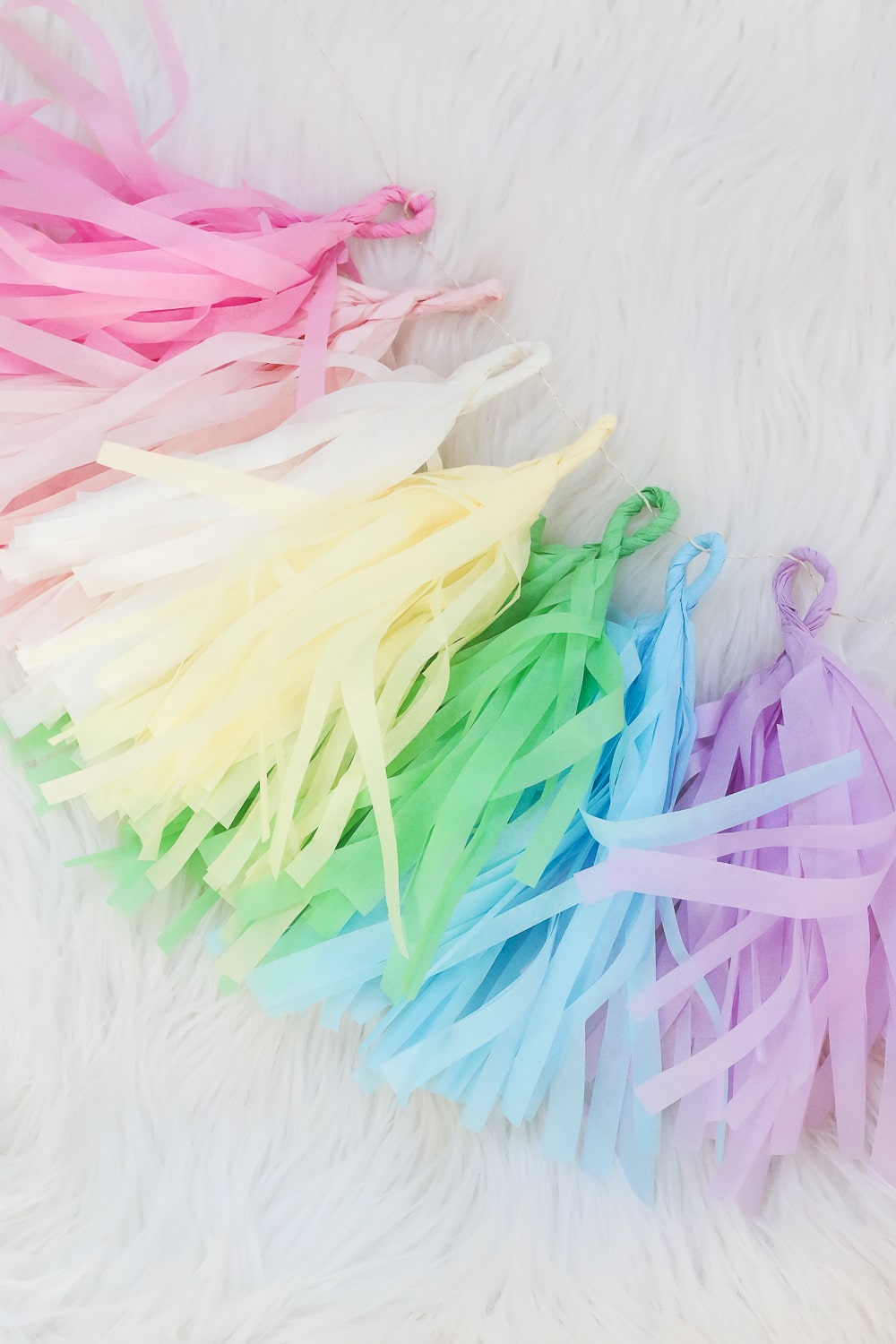 DIY pastel tissue garland for spring by DIY blogger Stephanie Ziajka on Diary of a Debutante