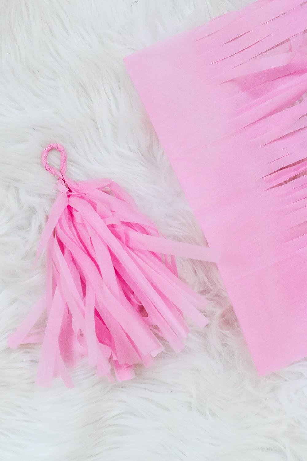 DIY blogger Stephanie Ziajka of Diary of a Debutante shows how to create a loop for DIY tissue tassels