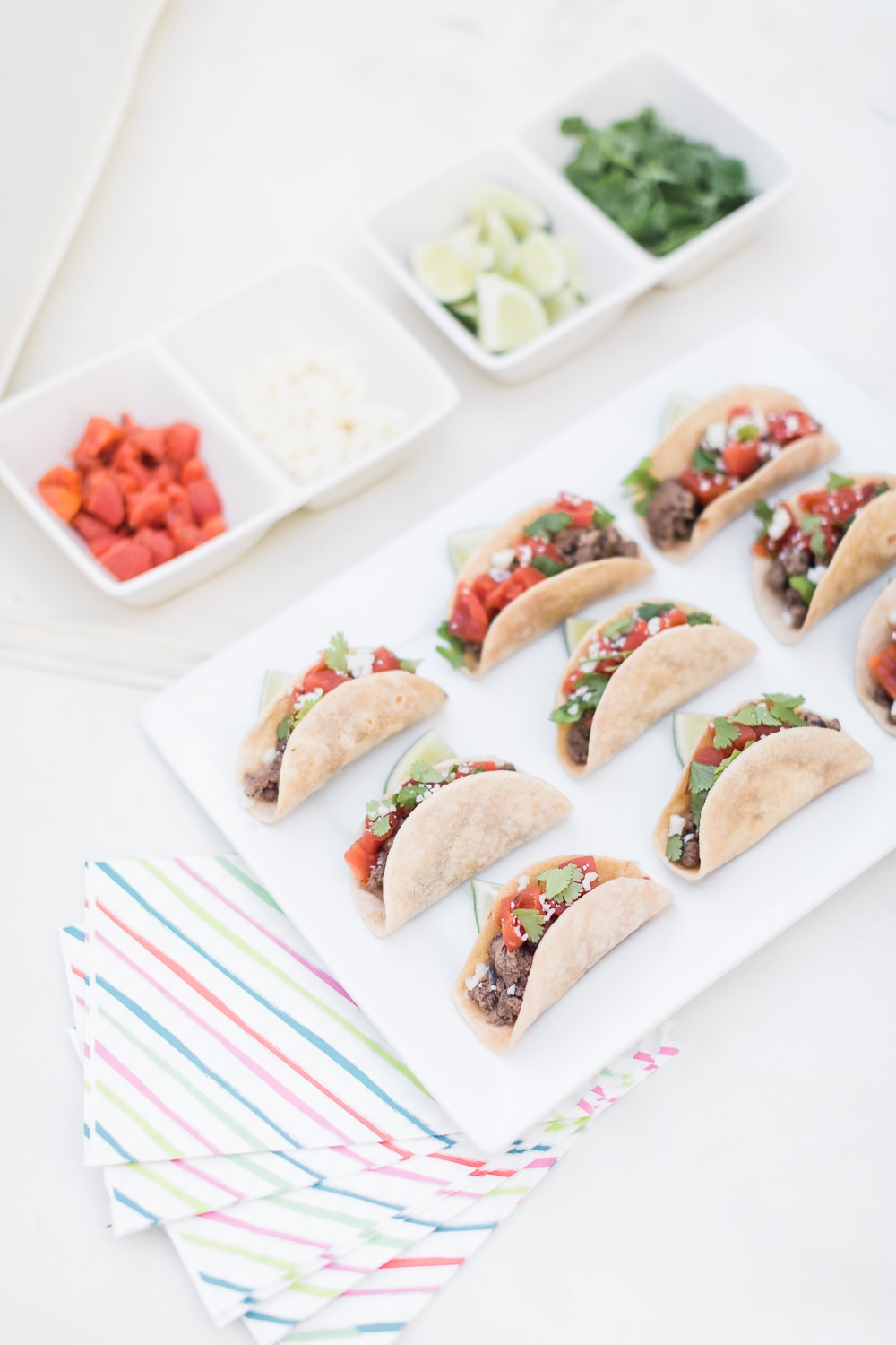 Blogger Stephanie Ziajka shares her go-to easy mini tacos recipe for National Beef Month on Diary of a Debutante