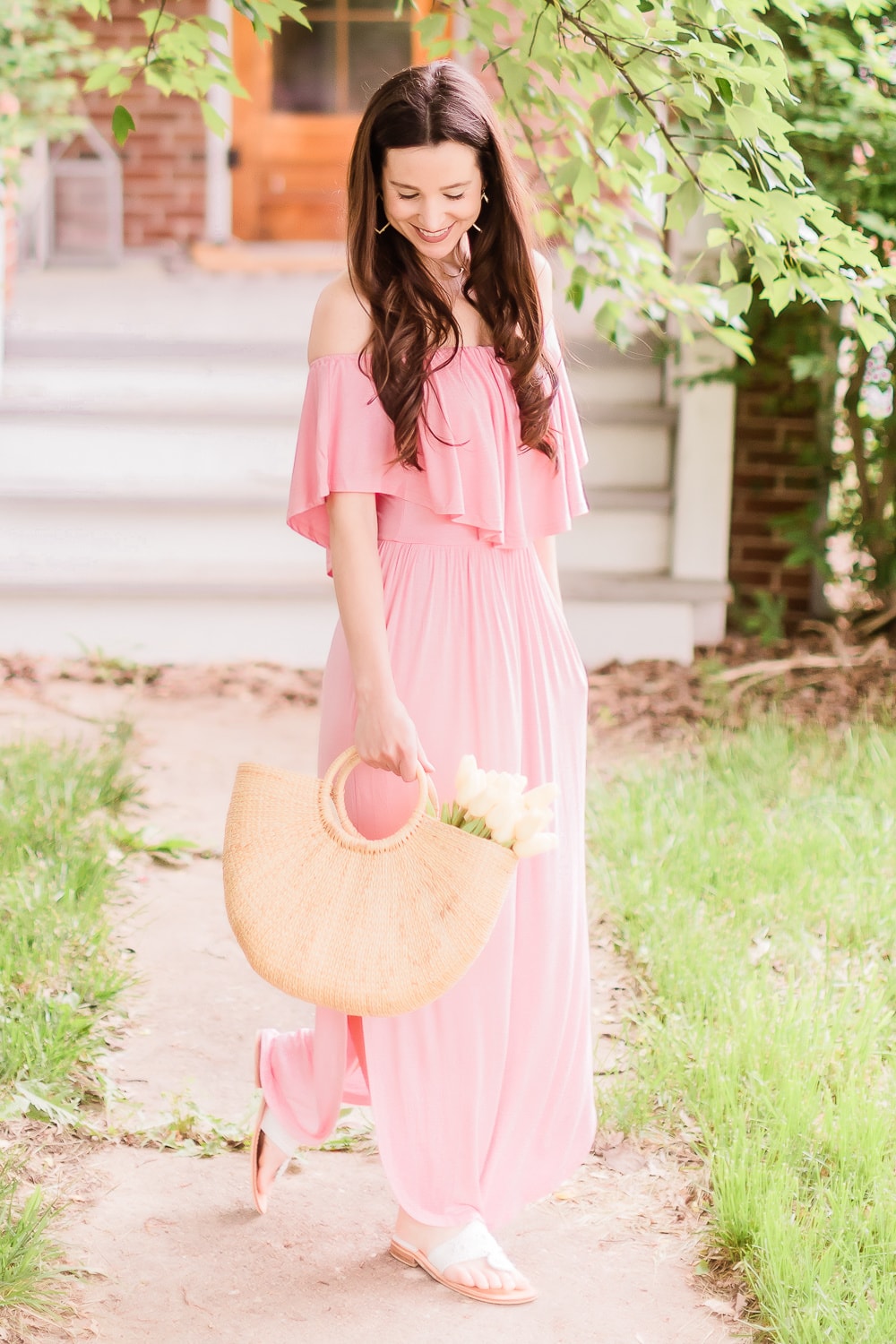 Affordable fashion blogger Stephanie Ziajka styles a pink off shoulder split maxi dress on Diary of a Debutante