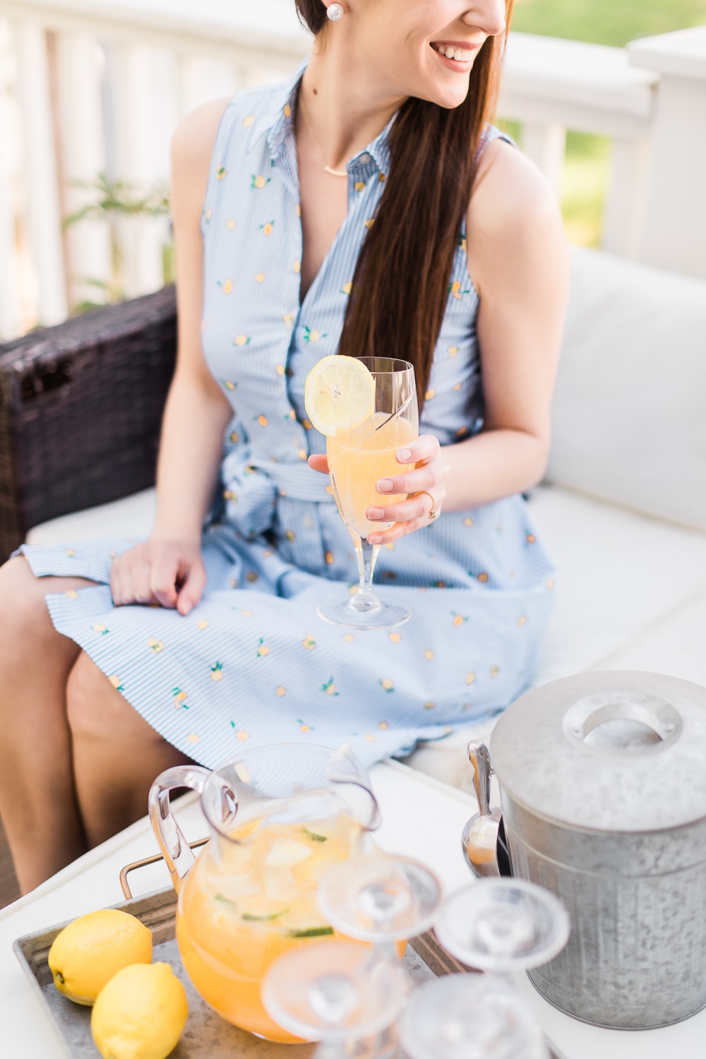 Blogger Stephanie Ziajka shares a refreshing sparkling wine punch made with sparkling Moscato, orange juice, grapefruit juice, St. Germain, lemon juice, and lime juice on Diary of a Debutante