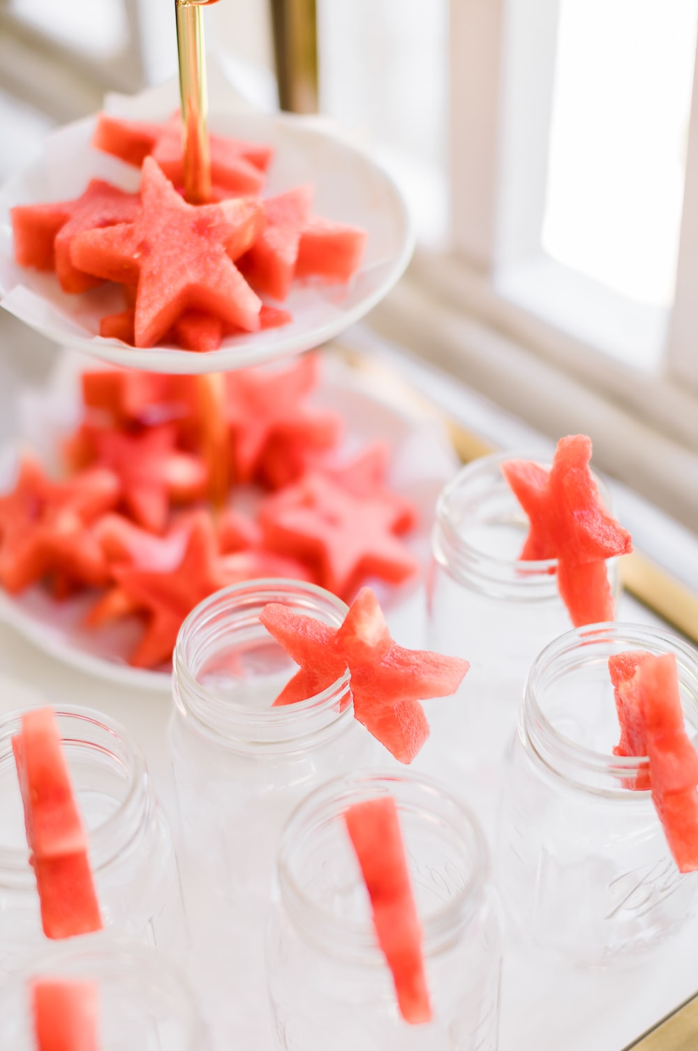 Star shaped watermelon garnishes made by blogger Stephanie Ziajka on Diary of a Debutante