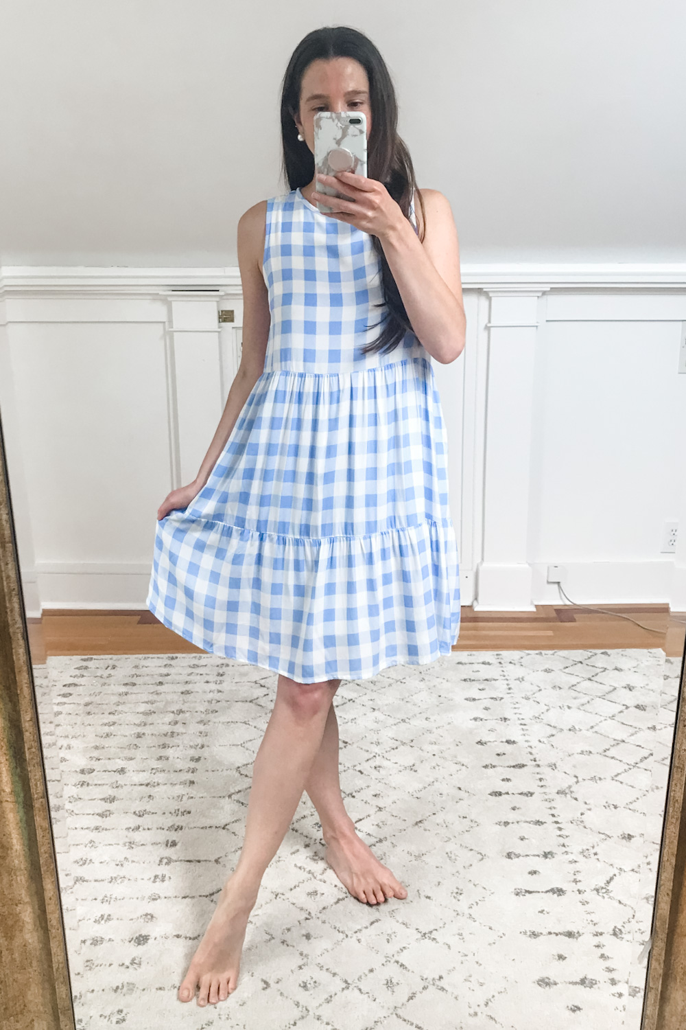 As part of a summer try on haul, affordable fashion blogger Stephanie Ziajka tries on a blue Amazon gingham ruffle sundress on Diary of a Debutante
