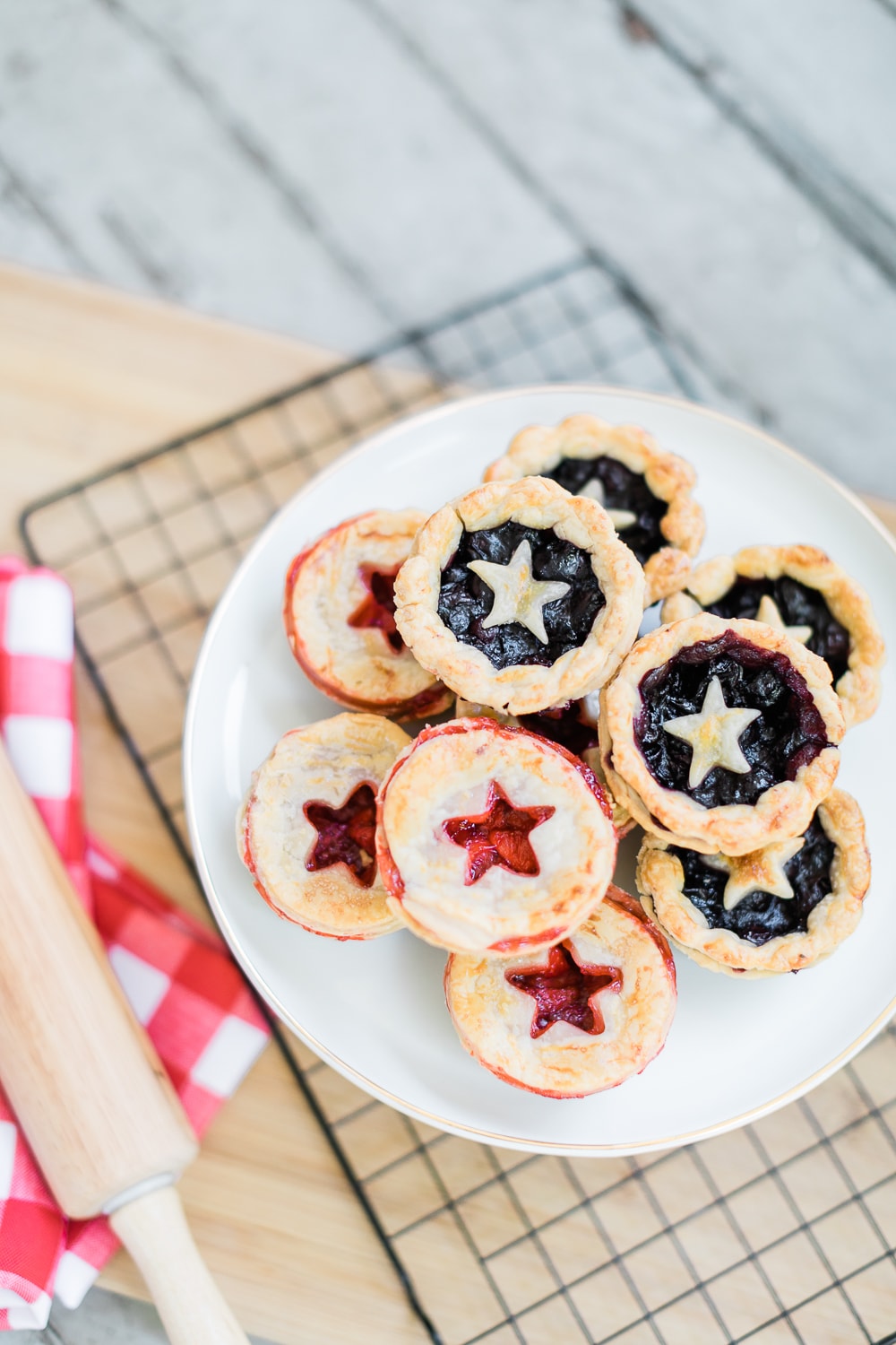 Blogger Stephanie Ziajka shares how to make mini blueberry pies in muffin tins on Diary of a Debutante
