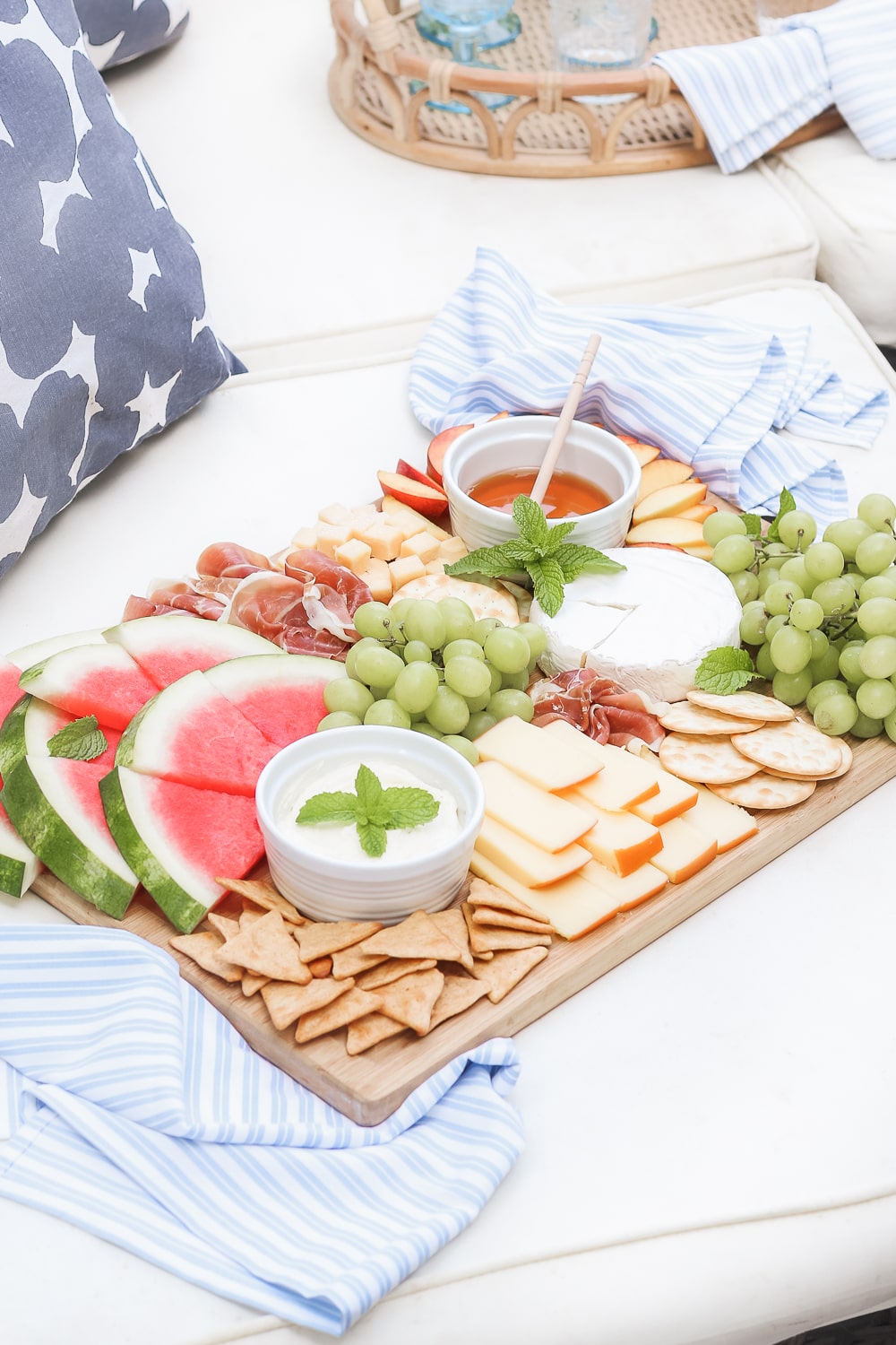 Blogger Stephanie Ziajka shares tips for building the perfect summer charcuterie board on Diary of a Debutante