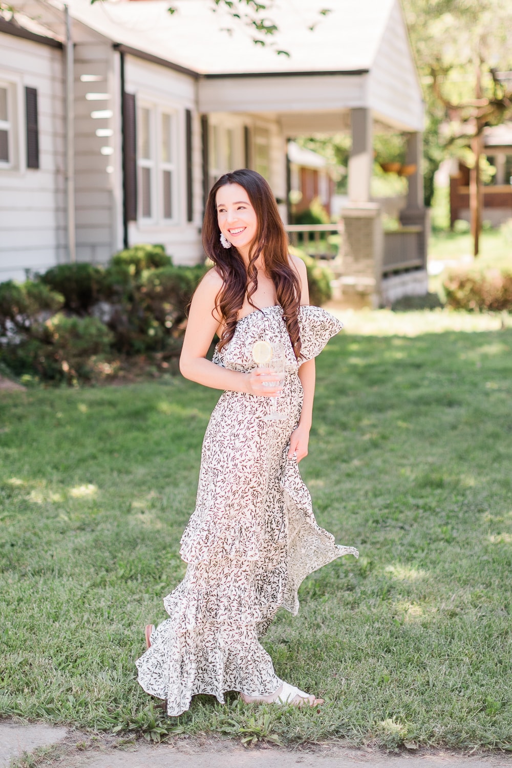Affordable fashion blogger Stephanie Ziajka shows how to wear a green ruffle maxi dress on Diary of a Debutante
