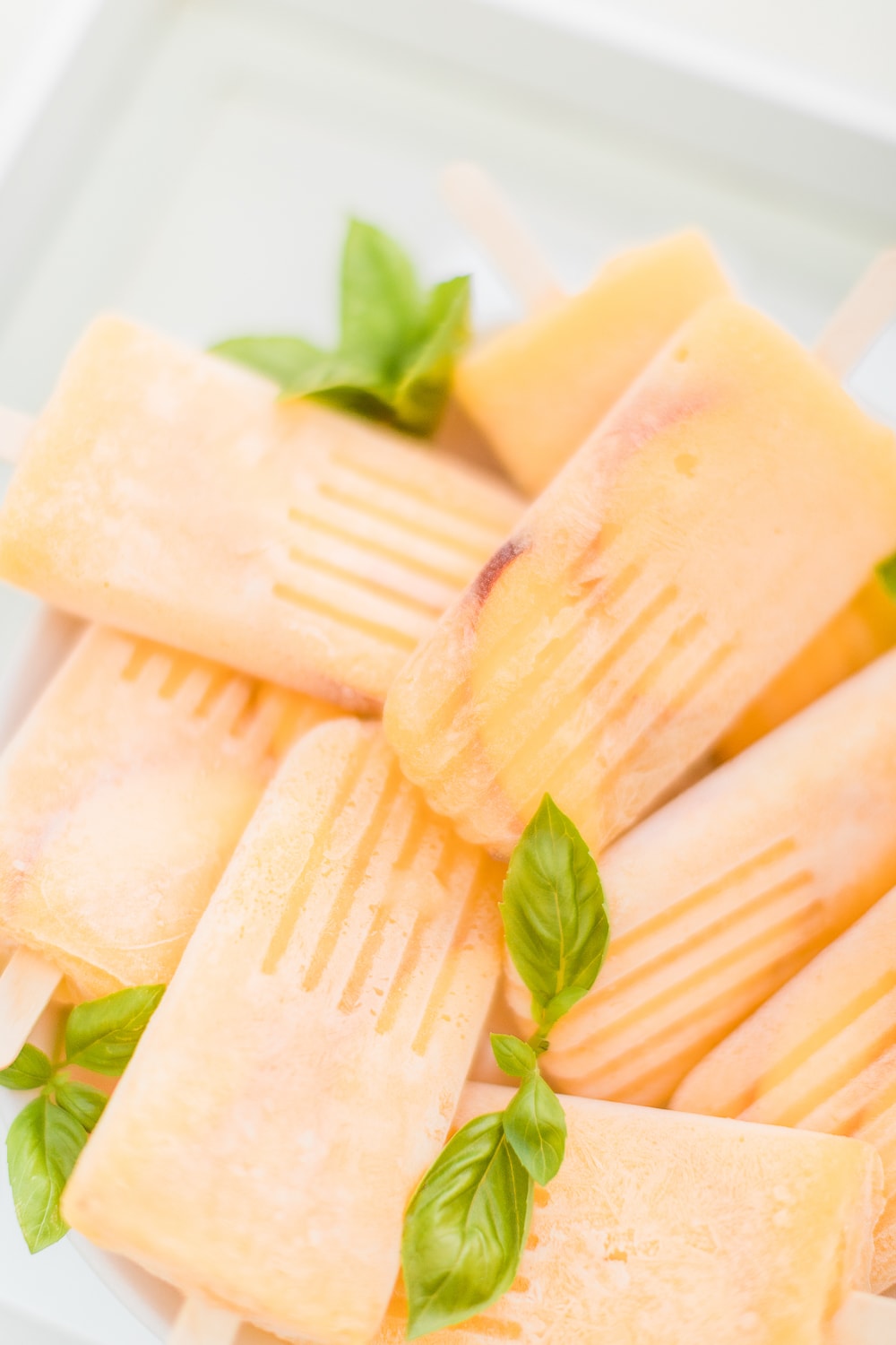 Southern lifestyle blogger Stephanie Ziajka shares her recipe for bellini popsicles on Diary of a Debutante