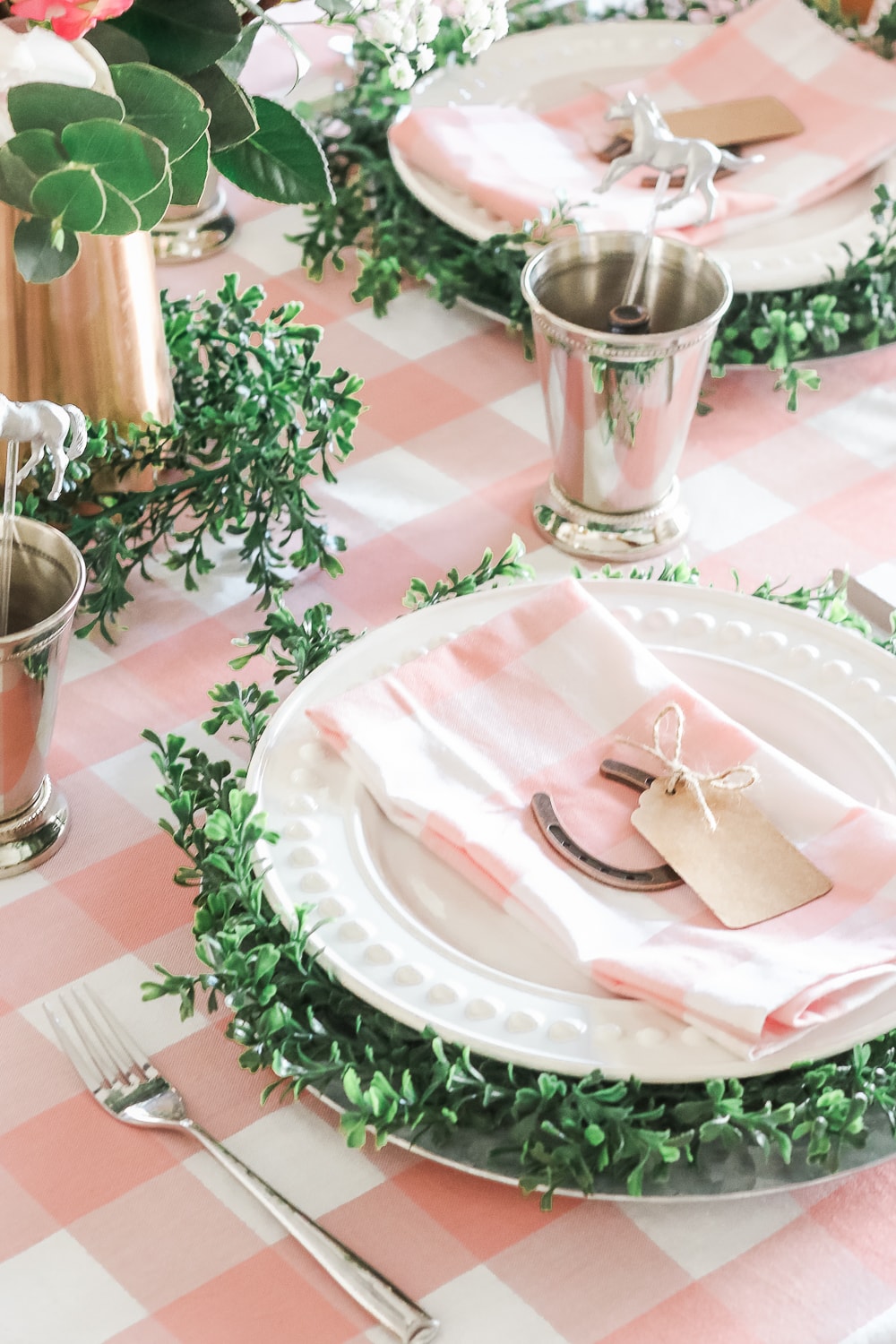 Southern blogger Stephanie Ziajka shows how to make your own DIY greenery charger plates and style them for Derby Day on Diary of a Debutante