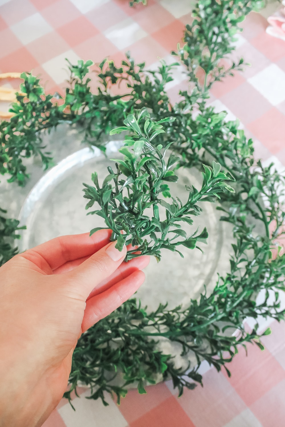 DIY blogger Stephanie Ziajka shows how to make your own boxwood charger plates on Diary of a Debutante