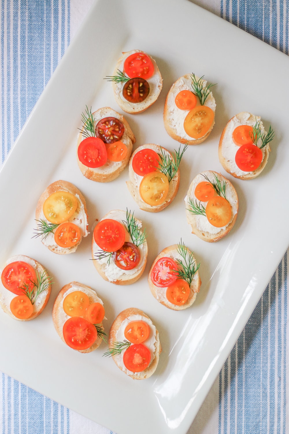 Tomato and goat cheese crostinis by southern lifestyle blogger Stephanie Ziajka of Diary of a Debutante