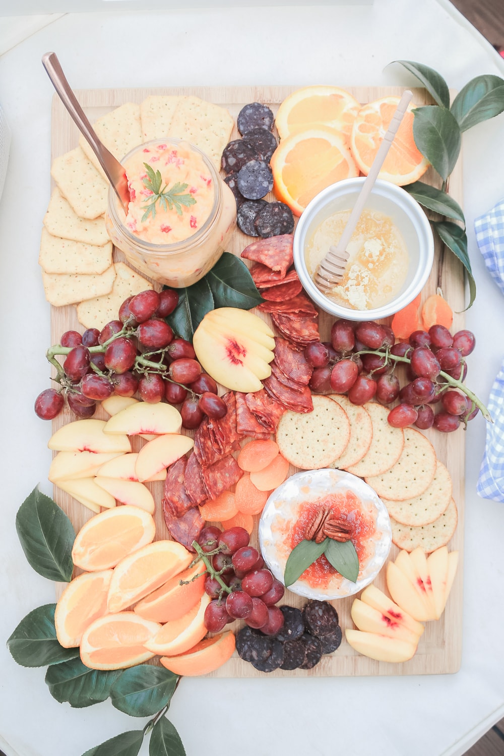 Blogger Stephanie Ziajka shares tips for the perfect charcuterie board (including listing out all the things to put on a charcuterie board) on Diary of a Debutante