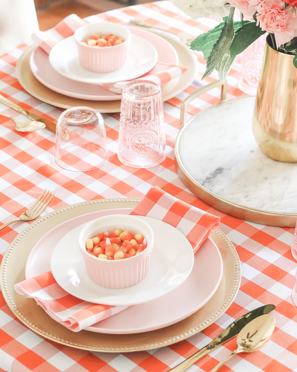 Pink and orange Halloween tablescape ideas by southern lifestyle blogger Stephanie Ziajka on Diary of a Debutante