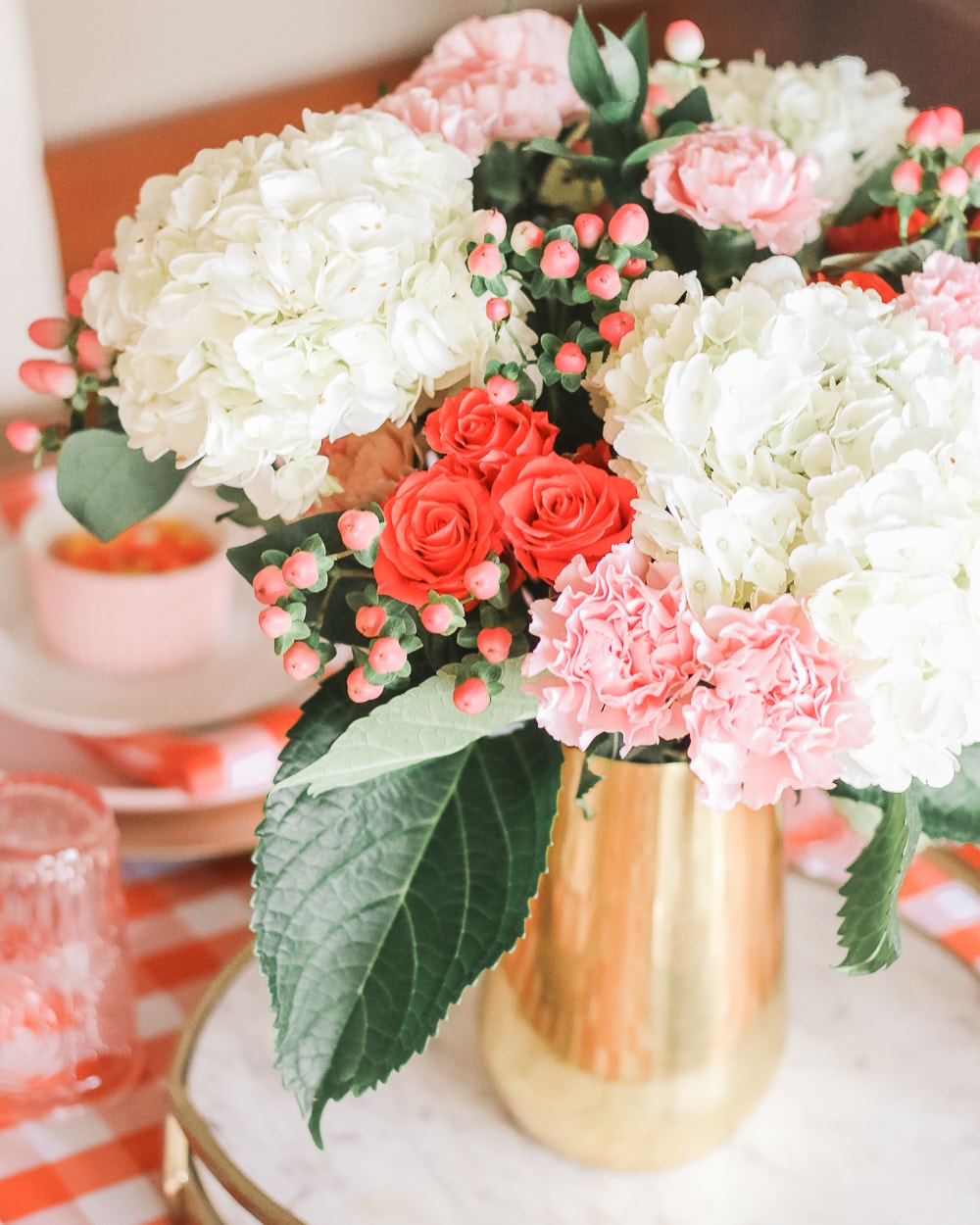 Pink and orange Halloween floral arrangement designed by southern lifestyle blogger Stephanie Ziajka on Diary of a Debutante