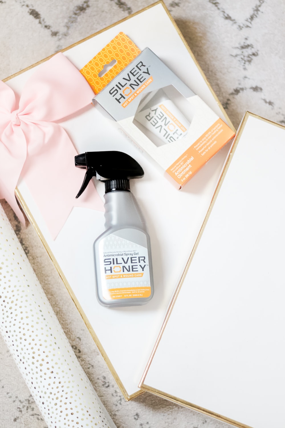 Silver Honey Antimicrobial Spray Gel and Silver Honey Antimicrobial Ointment featured in blogger Stephanie Ziajka's DIY pet first aid kit on Diary of a Debutante