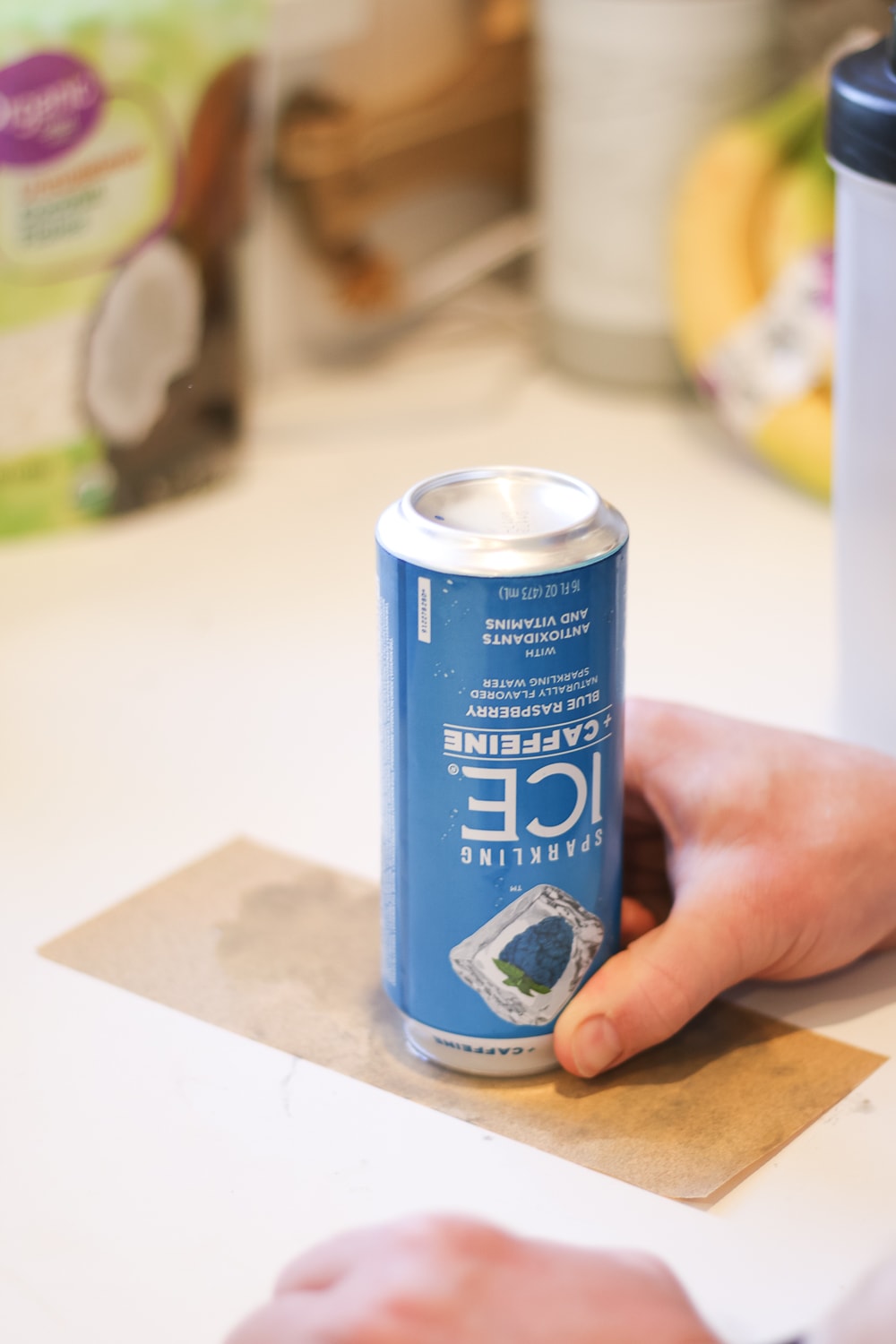 DIY blogger Stephanie Ziajka shows how to remove the top of a soda can without damaging it on Diary of a Debutante