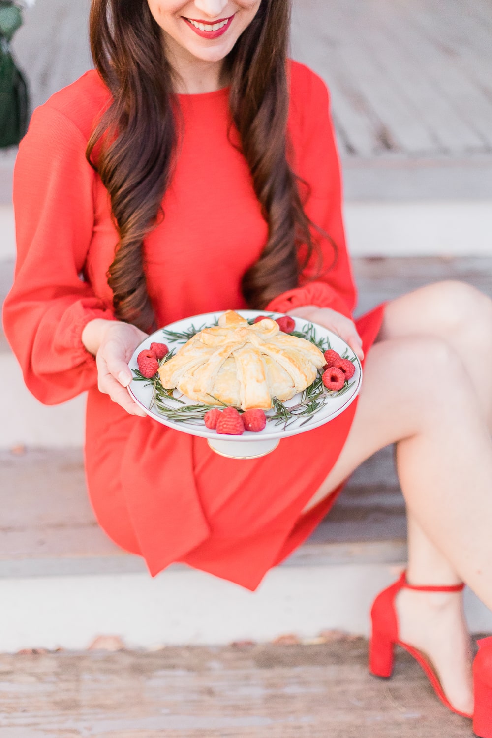 Blogger Stephanie Ziajka shares her recipe for a baked brie wheel with raspberry jelly on Diary of a Debutante