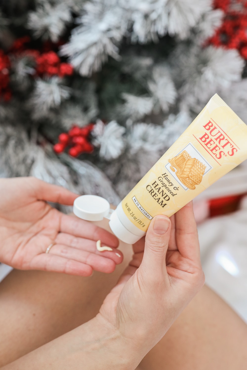 Blogger Stephanie Ziajka shares why Burt's Bees Honey and Grapeseed Oil Hand Cream is a great stocking stuffer for guys on Diary of a Debutante
