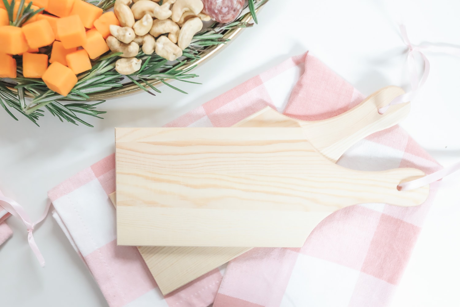 Personalized mini cheese boards finished with food-safe oil by blogger Stephanie Ziajka on Diary of a Debutante