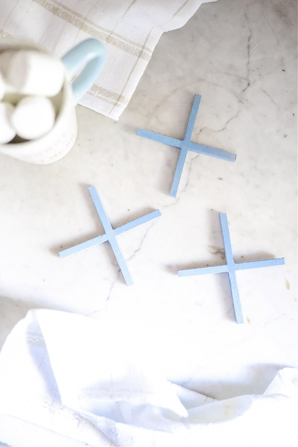 DIY blogger Stephanie Ziajka shows how to make your own DIY painted wood coasters with MakerX creative tools on Diary of a Debutante